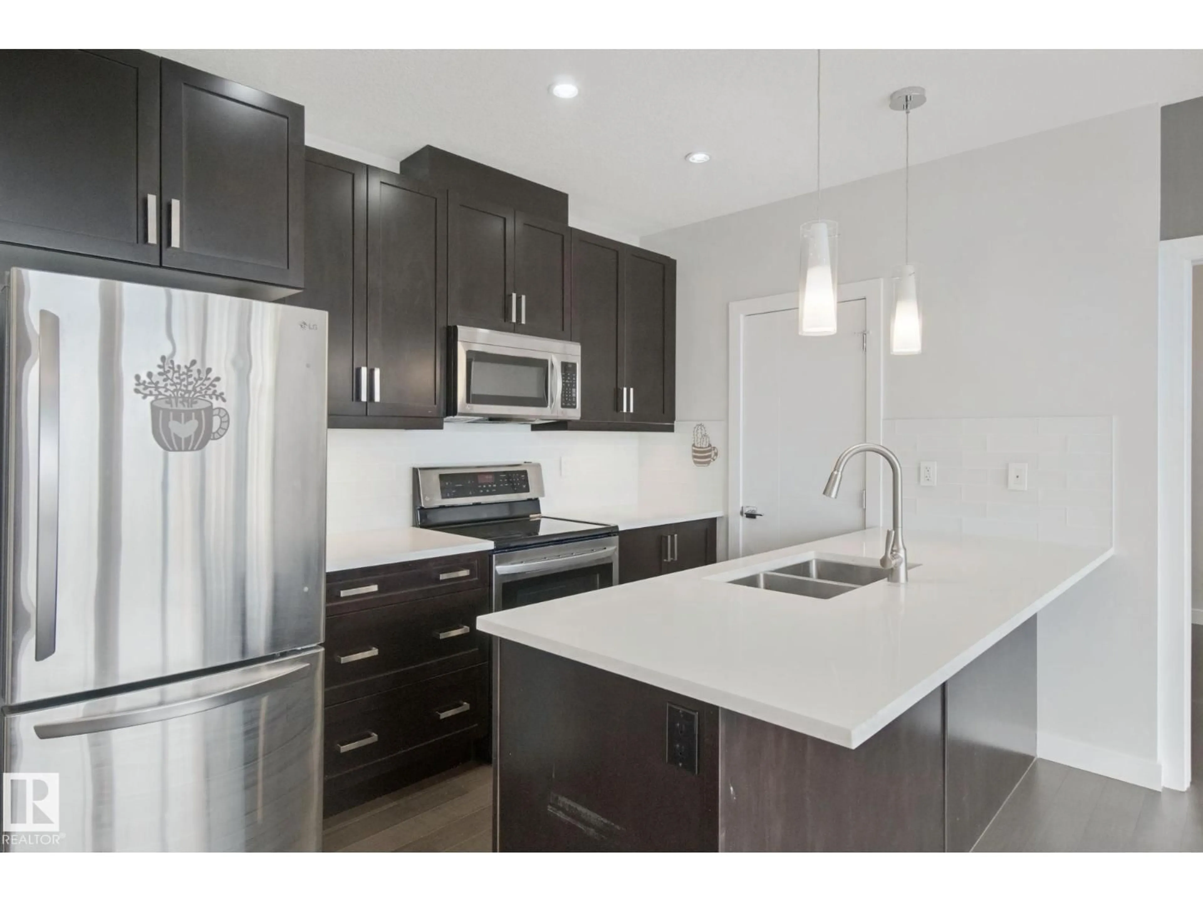 Open concept kitchen, unknown for 1806 10238 103 ST NW, Edmonton Alberta T5J0G6
