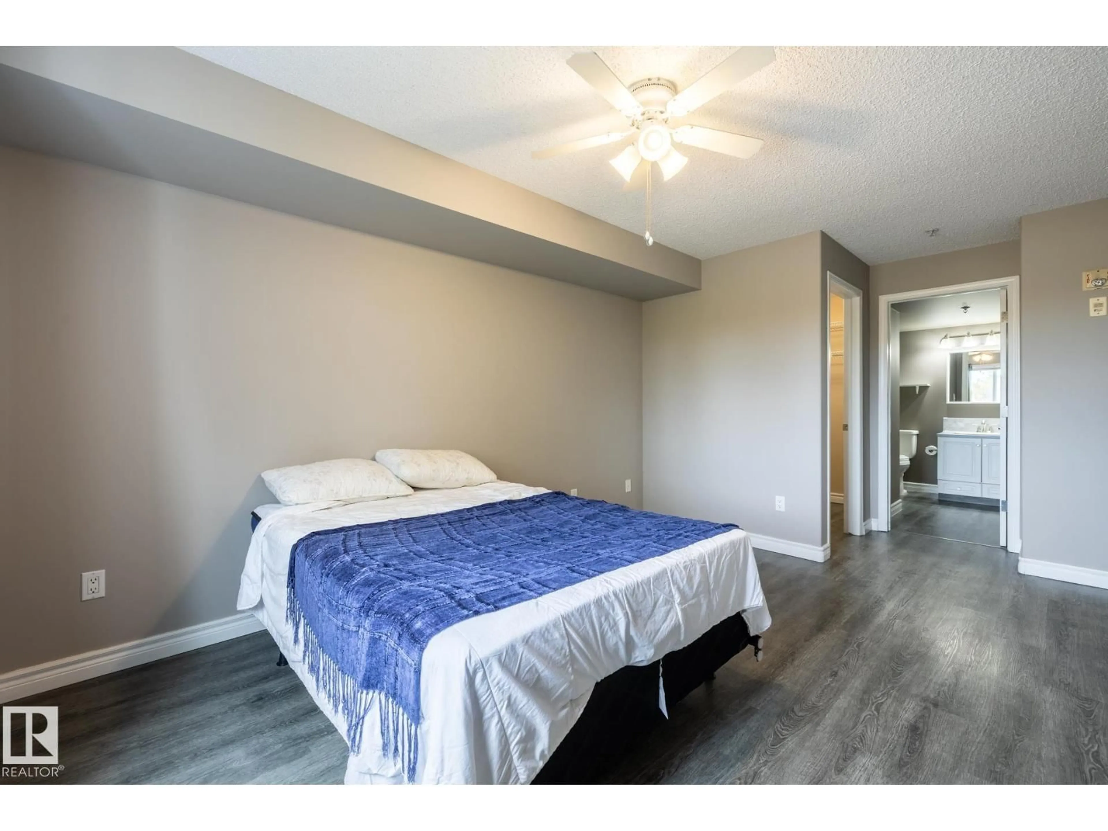 Bedroom with bed, wood/laminate floor for 310 - 13635 34 ST, Edmonton Alberta T5A0C4