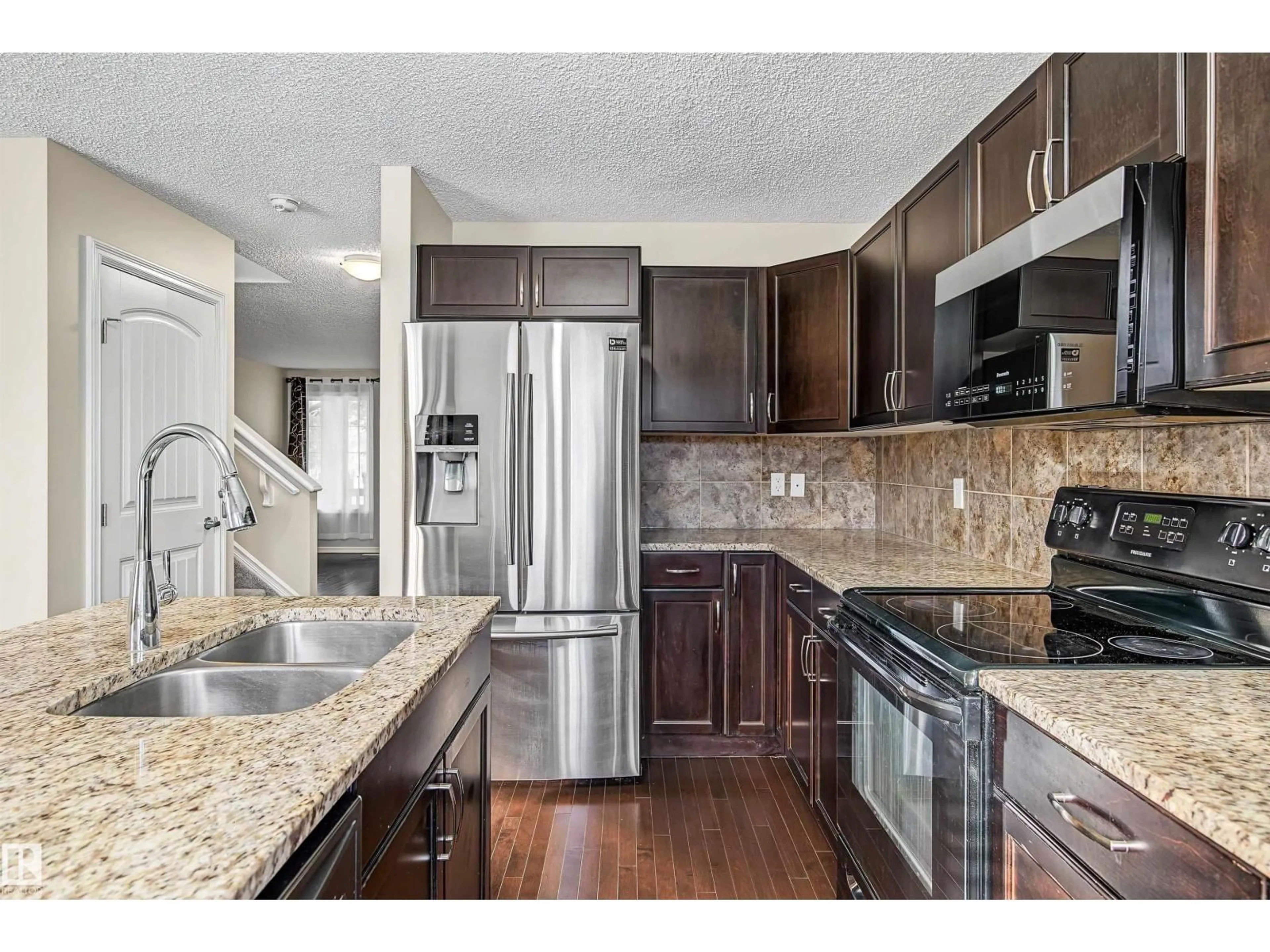 Open concept kitchen, unknown for 7062 CARDINAL WY, Edmonton Alberta T6W1Z2