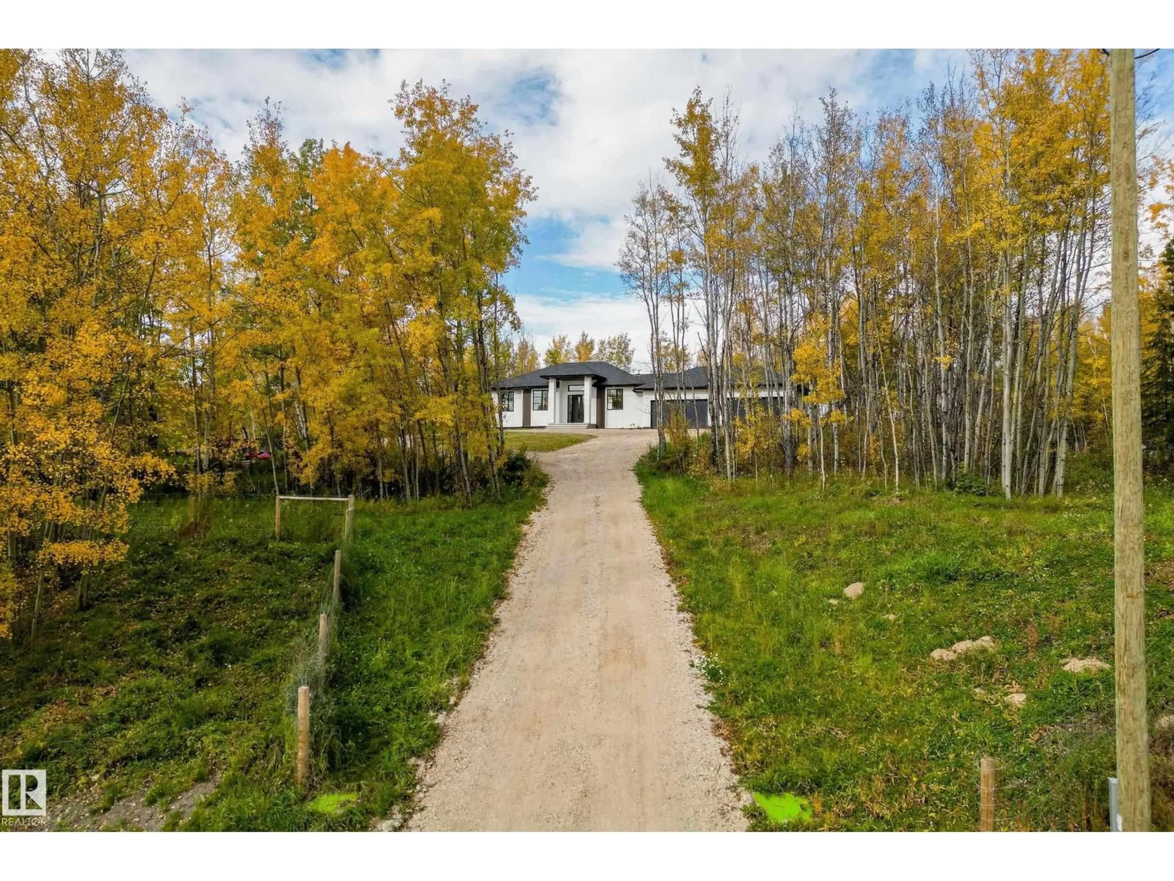 A pic from outside/outdoor area/front of a property/back of a property/a pic from drone, forest/trees view for 53319 - 10 RANGE ROAD 14, Rural Parkland County Alberta T7Y0C2