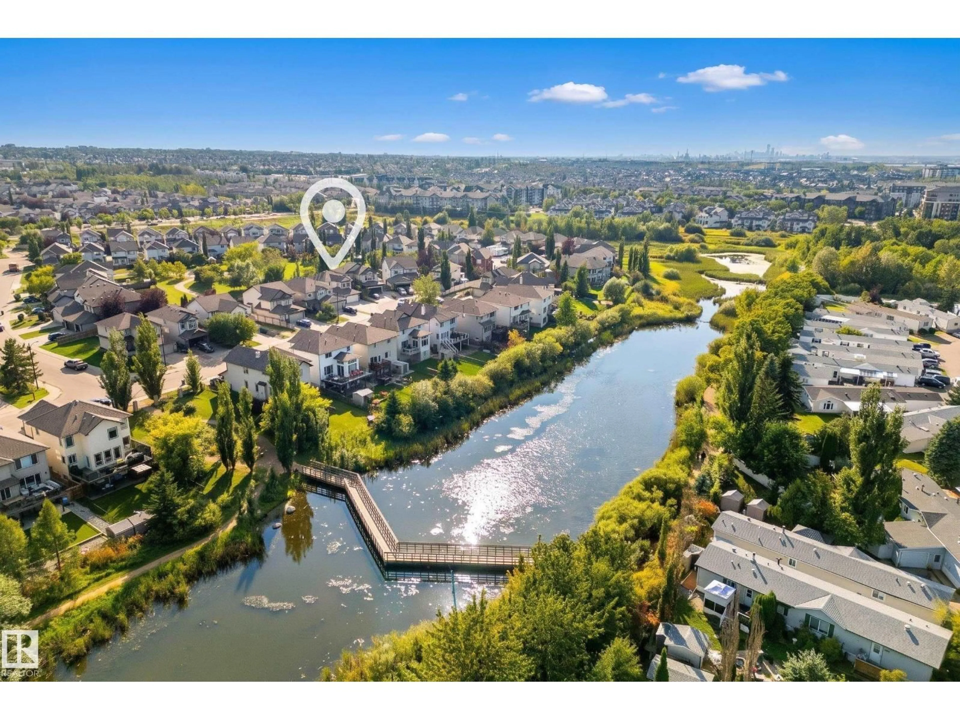 A pic from outside/outdoor area/front of a property/back of a property/a pic from drone, water/lake/river/ocean view for 65 SUMMERCOURT TC, Sherwood Park Alberta T8H2W1