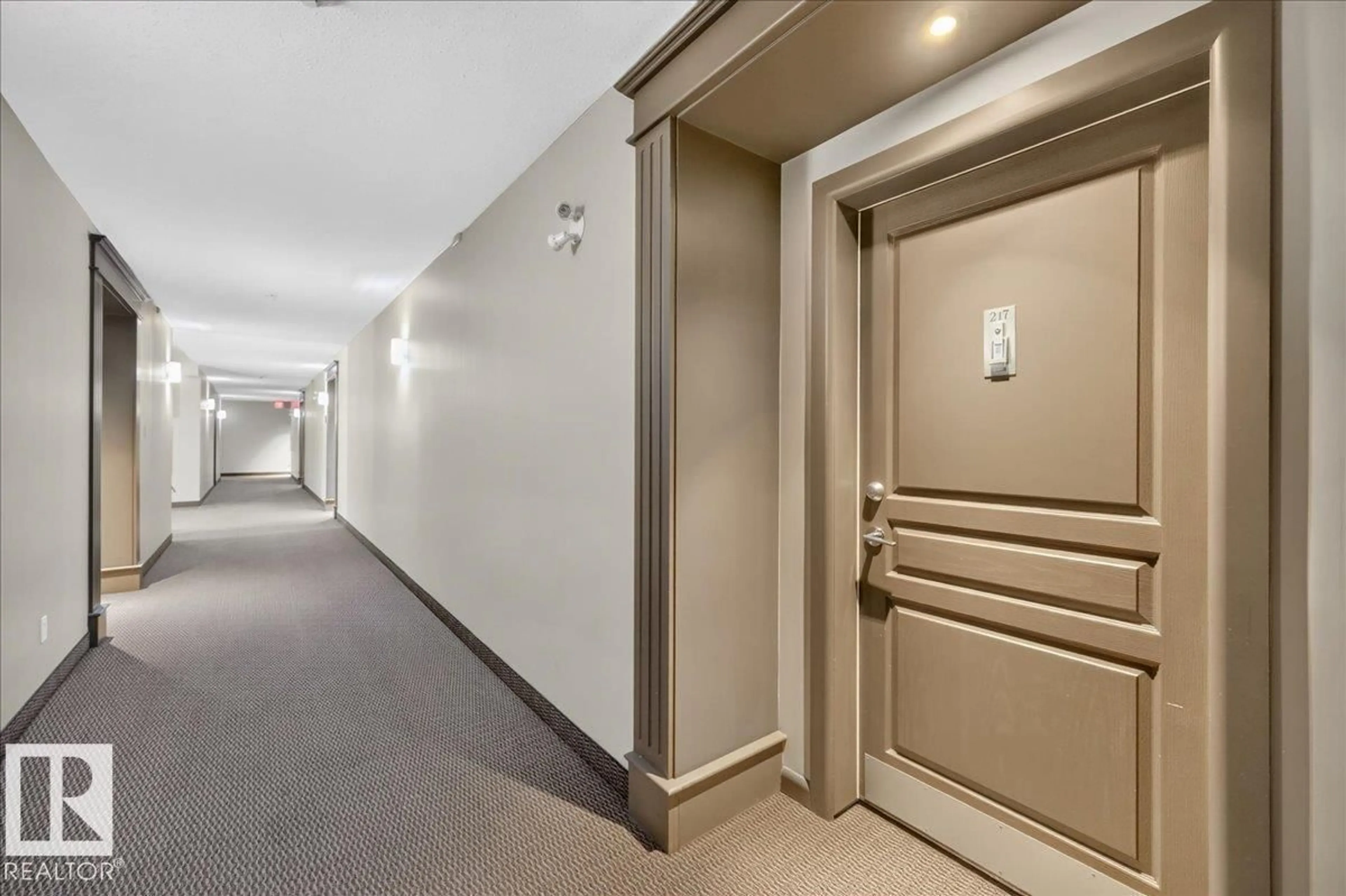 Indoor foyer for #217 - 160 MAGRATH RD, Edmonton Alberta T6R3T7