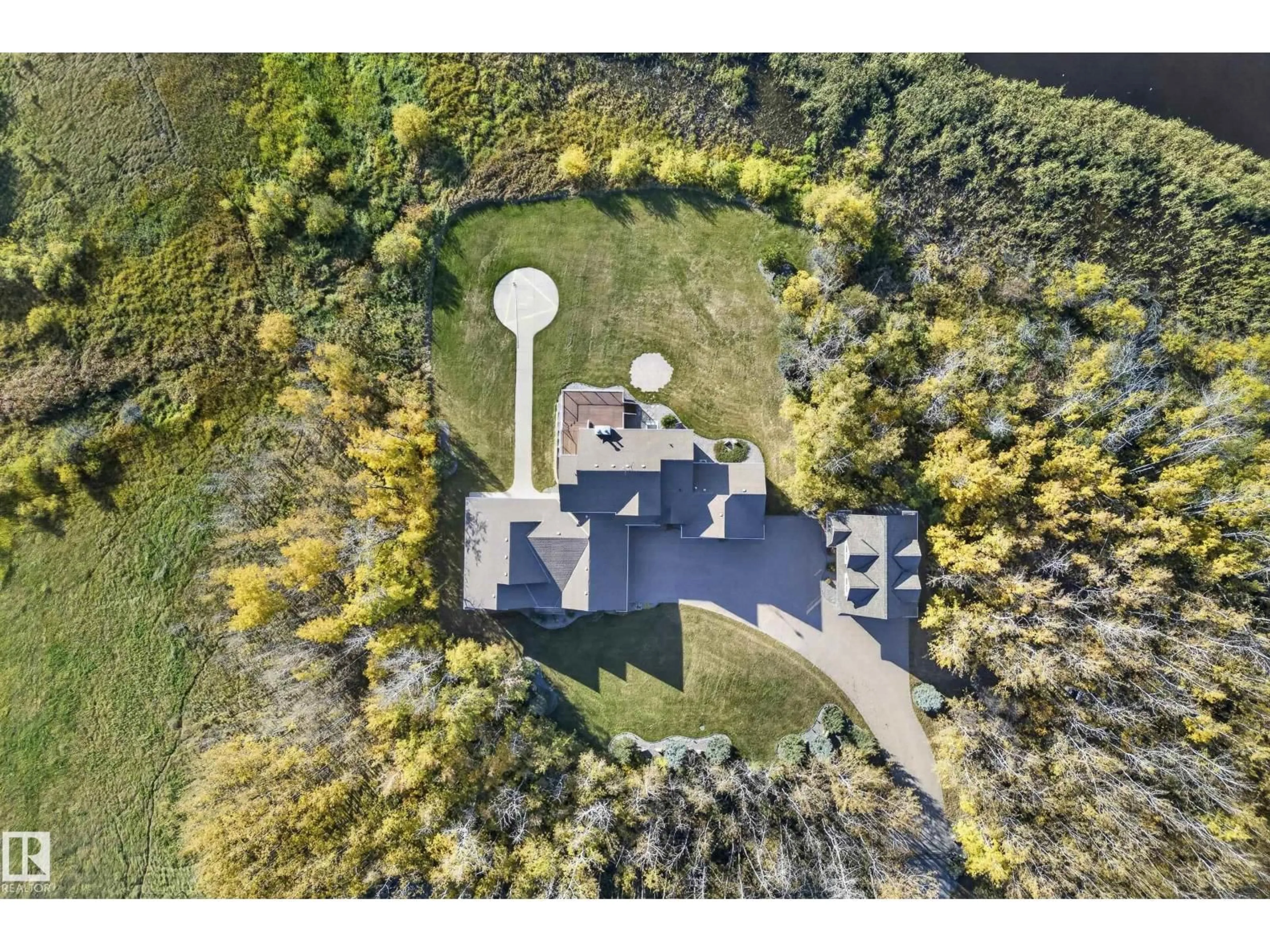 A pic from outside/outdoor area/front of a property/back of a property/a pic from drone, unknown for 50344 RGE RD 243, Rural Leduc County Alberta T4X0N5