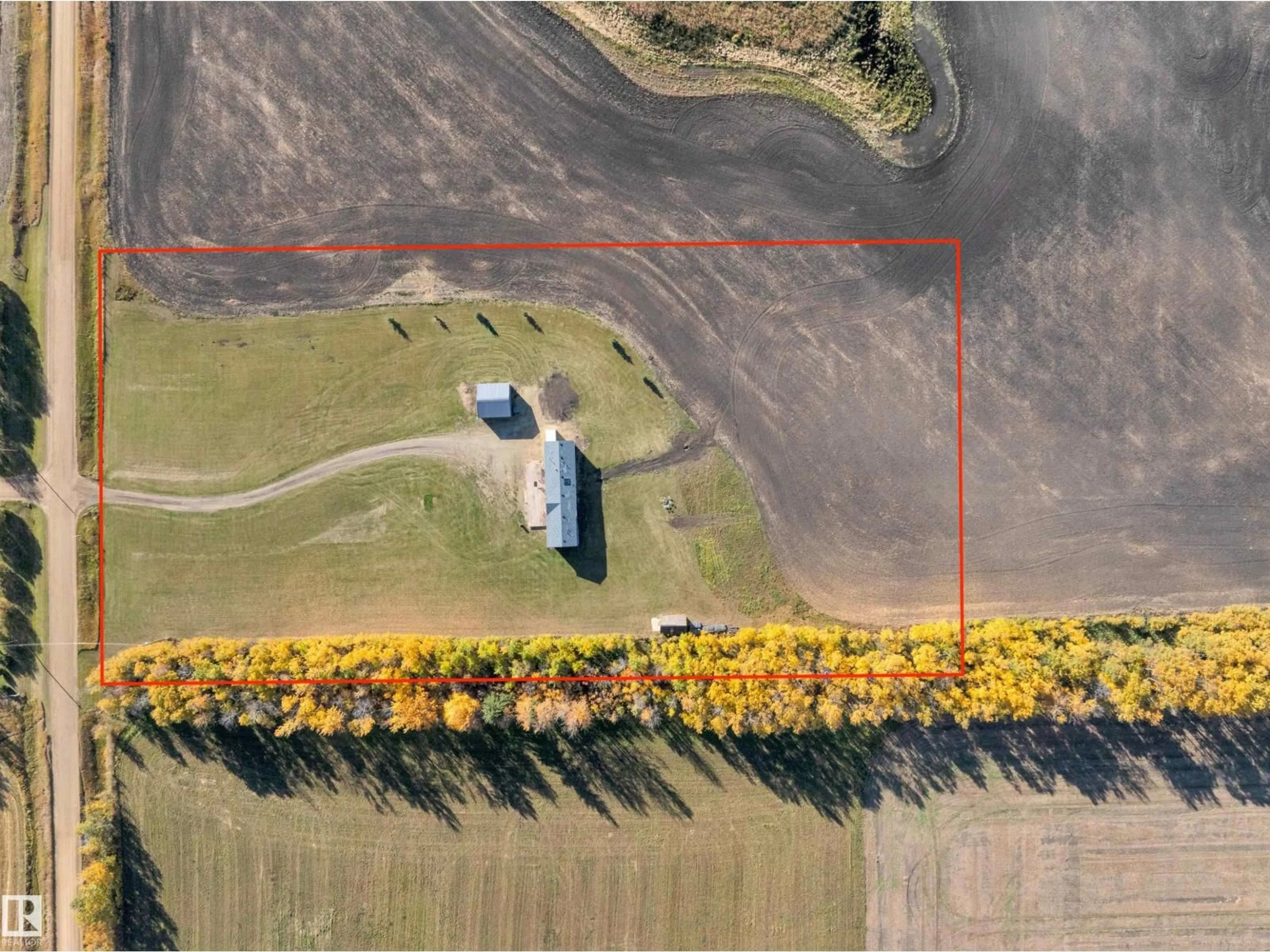 A pic from outside/outdoor area/front of a property/back of a property/a pic from drone, unknown for 48138 RGE RD 244, Rural Leduc County Alberta T4X2S6