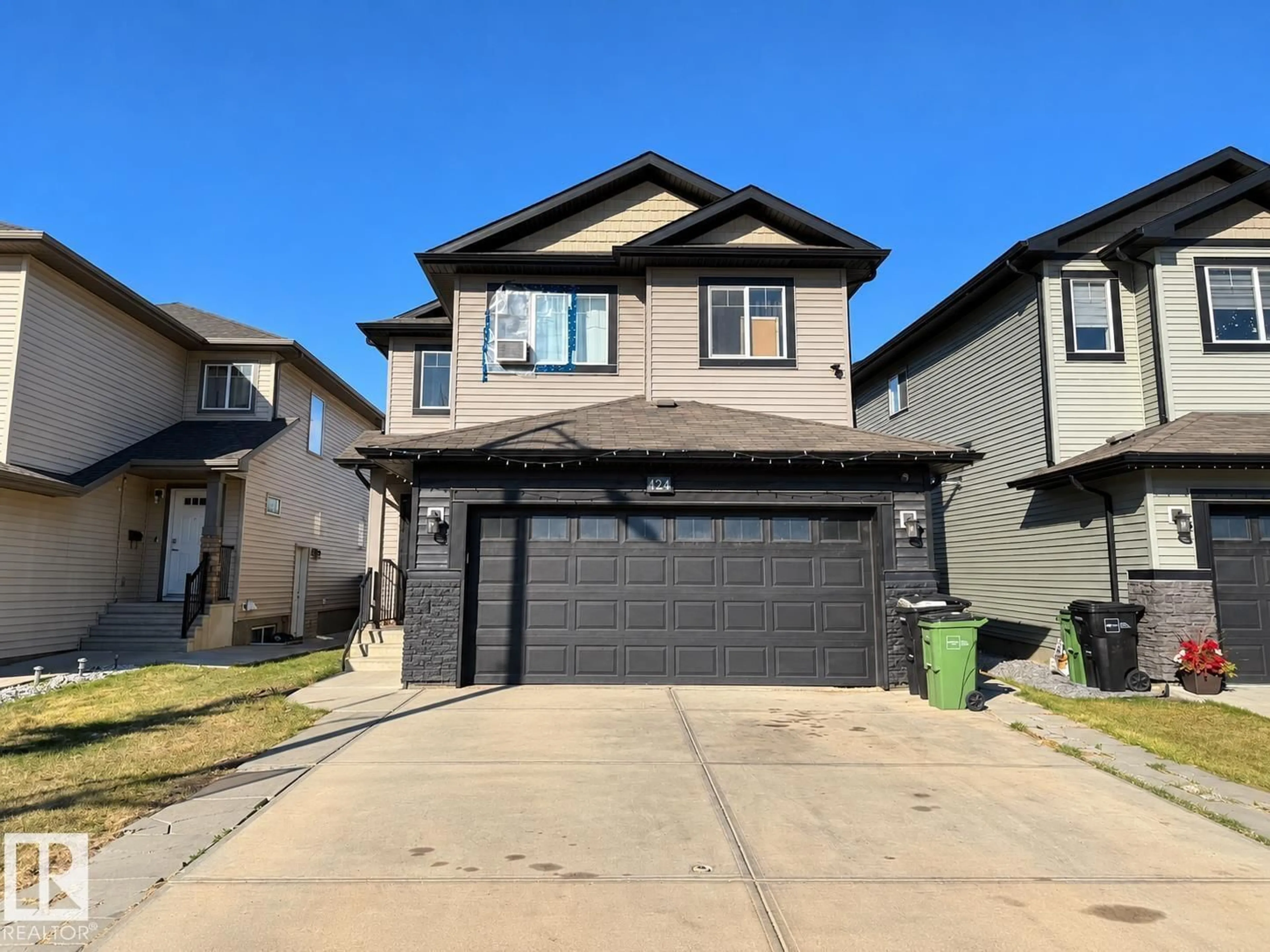 Home with vinyl exterior material, street for 424 42 AV, Edmonton Alberta T6T2G1
