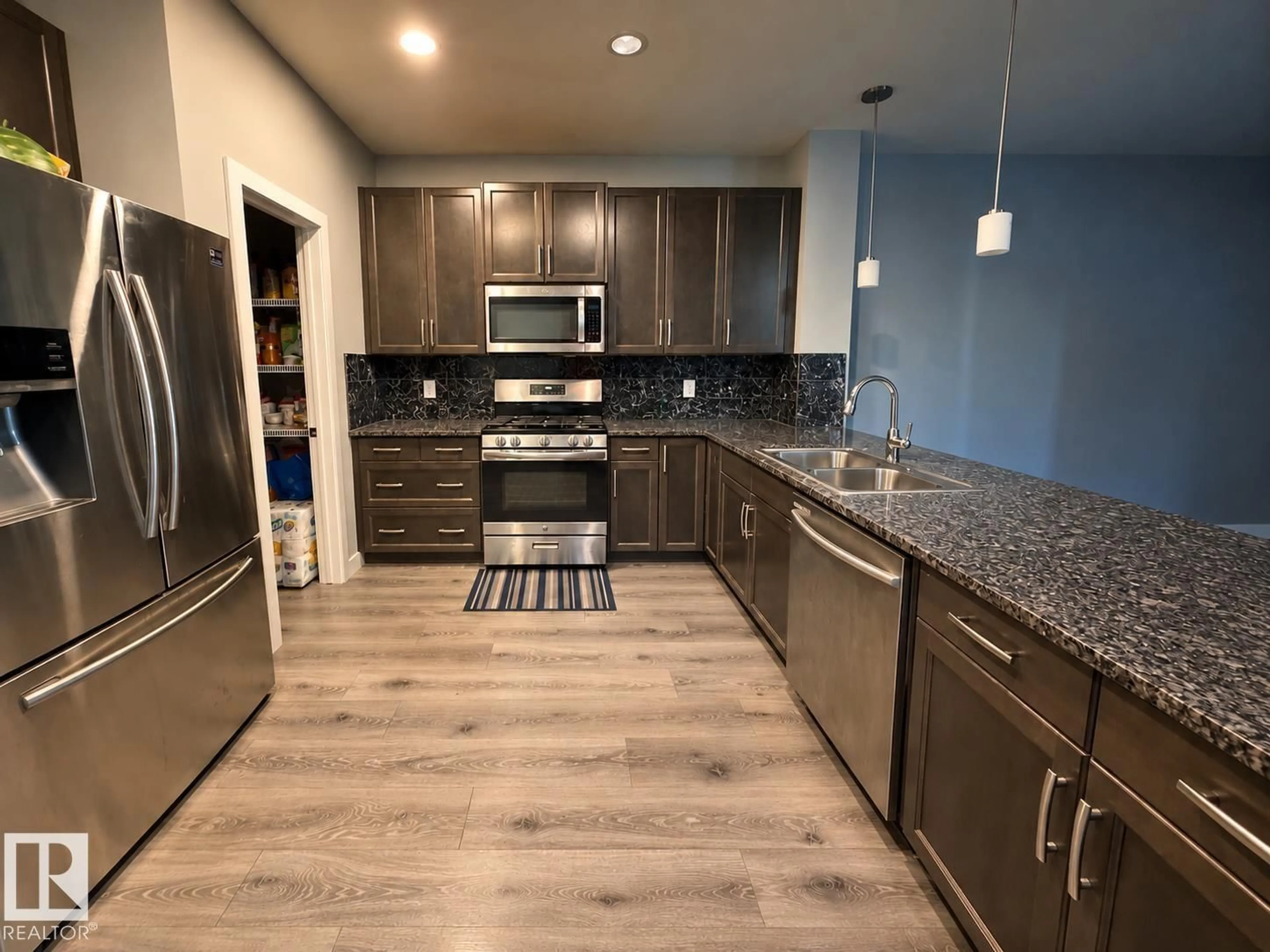 Open concept kitchen, unknown for 424 42 AV, Edmonton Alberta T6T2G1