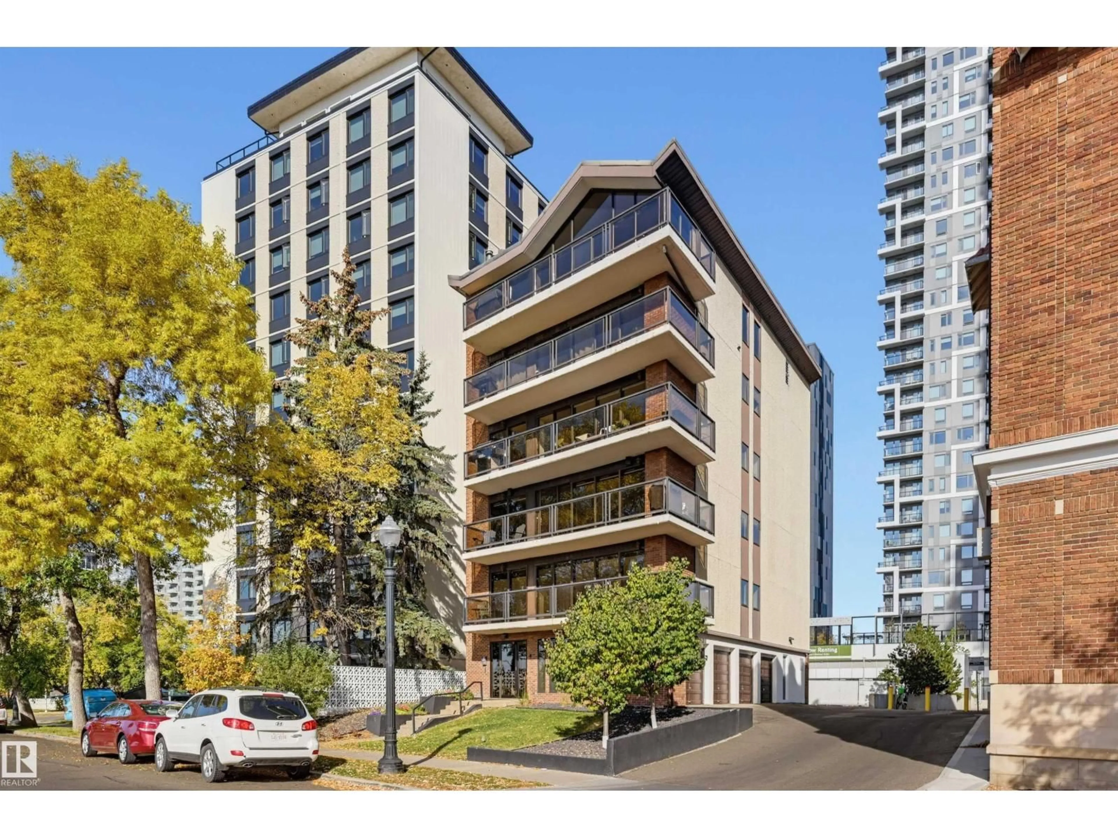 A pic from outside/outdoor area/front of a property/back of a property/a pic from drone, street for 11960 100 AV, Edmonton Alberta T5K0K5