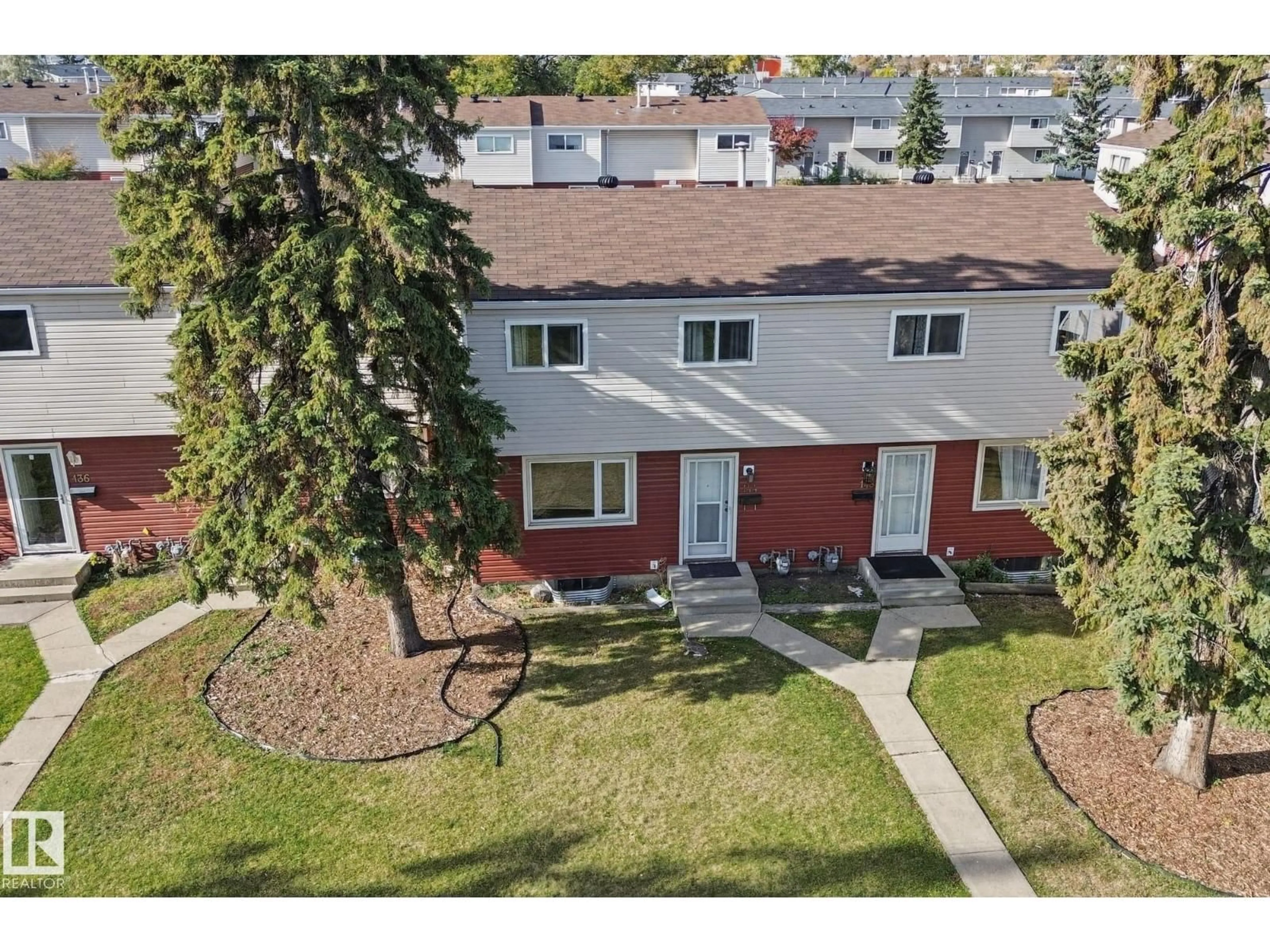 A pic from outside/outdoor area/front of a property/back of a property/a pic from drone, street for 144 HABITAT CR, Edmonton Alberta T5A2X7