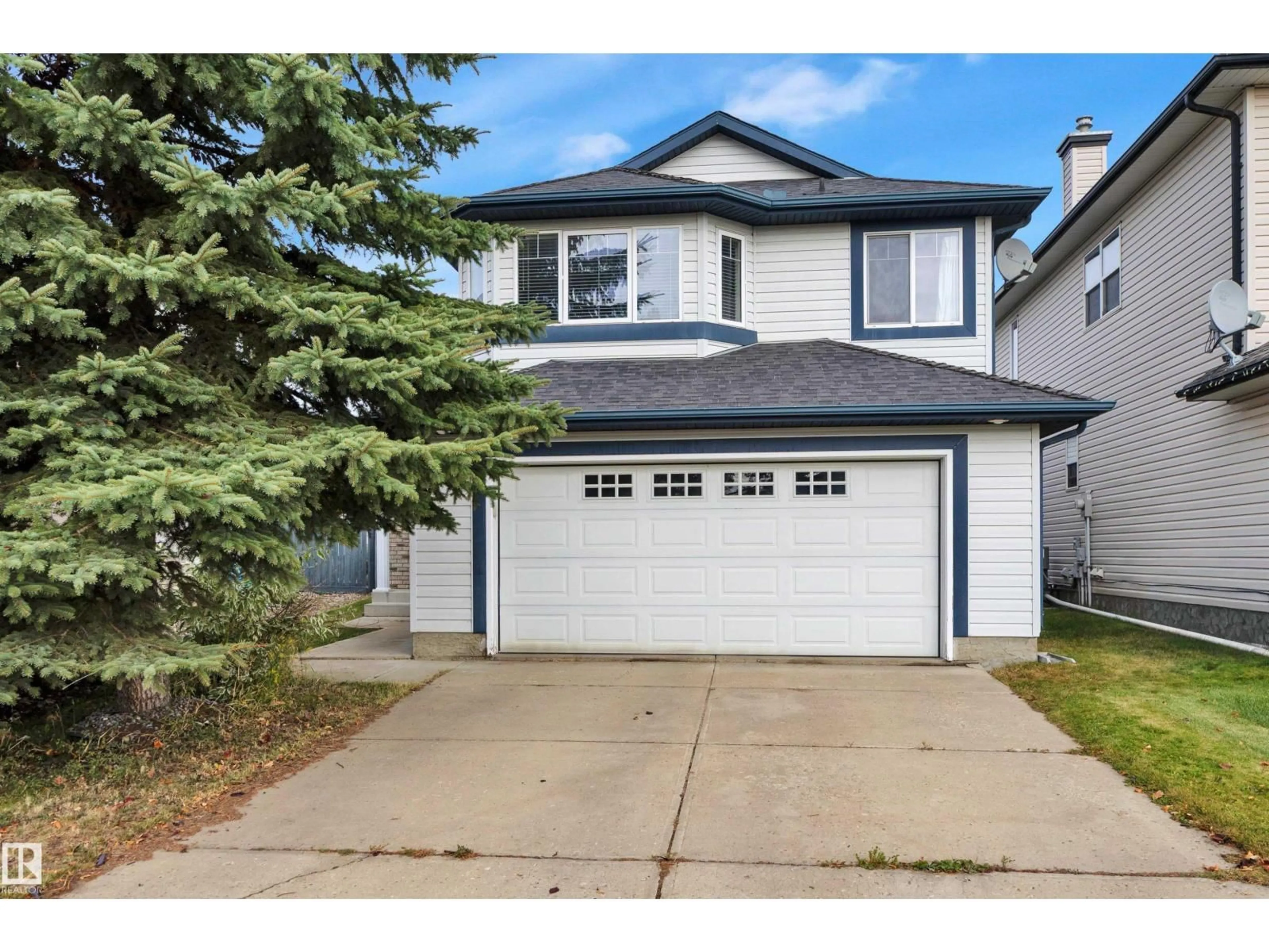 Home with vinyl exterior material, street for 2056 BLACKMUD CREEK DR, Edmonton Alberta T6W1E7