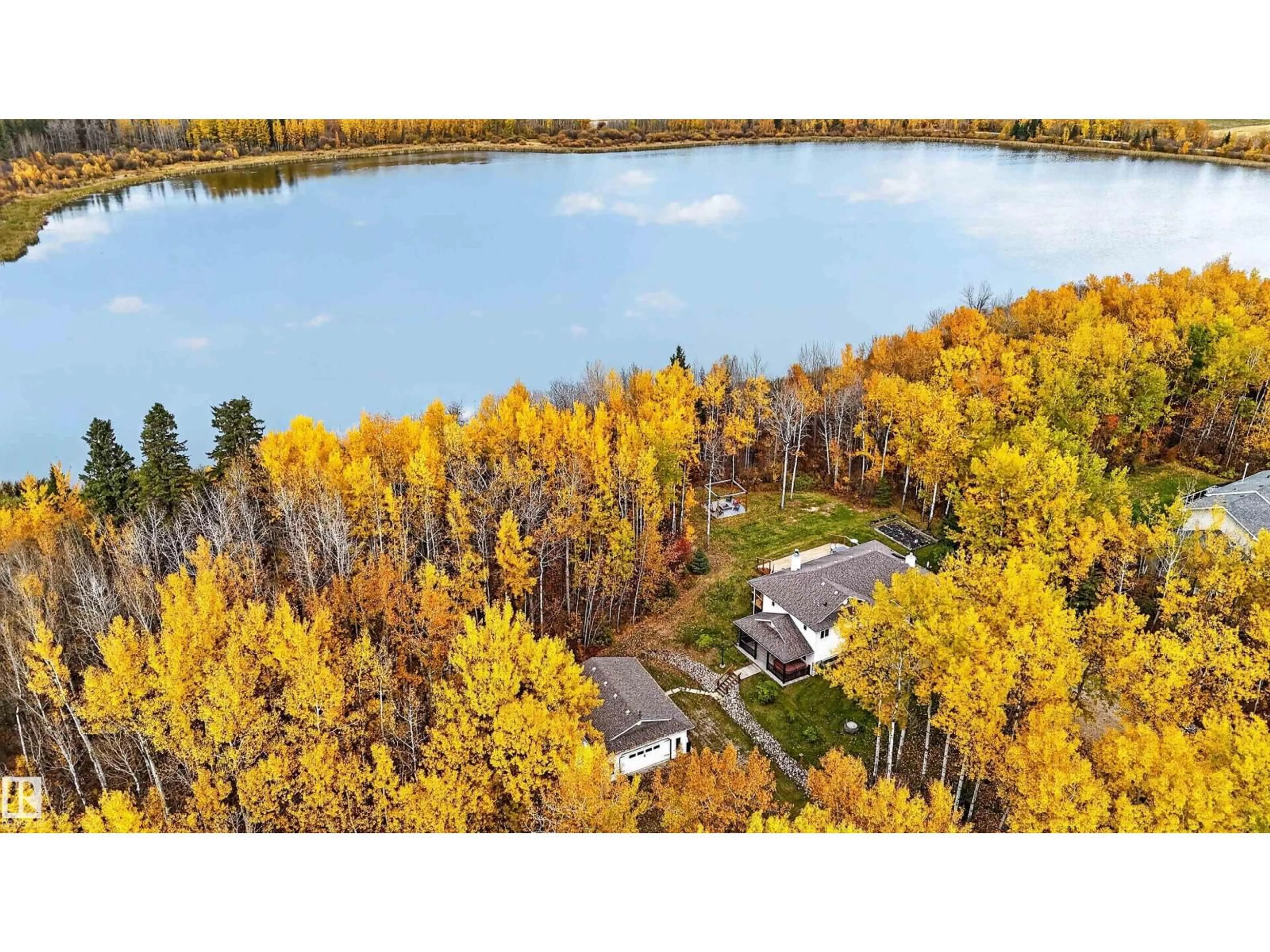 A pic from outside/outdoor area/front of a property/back of a property/a pic from drone, water/lake/river/ocean view for 6 - 53102 RGE ROAD 31, Rural Parkland County Alberta T0E0N0