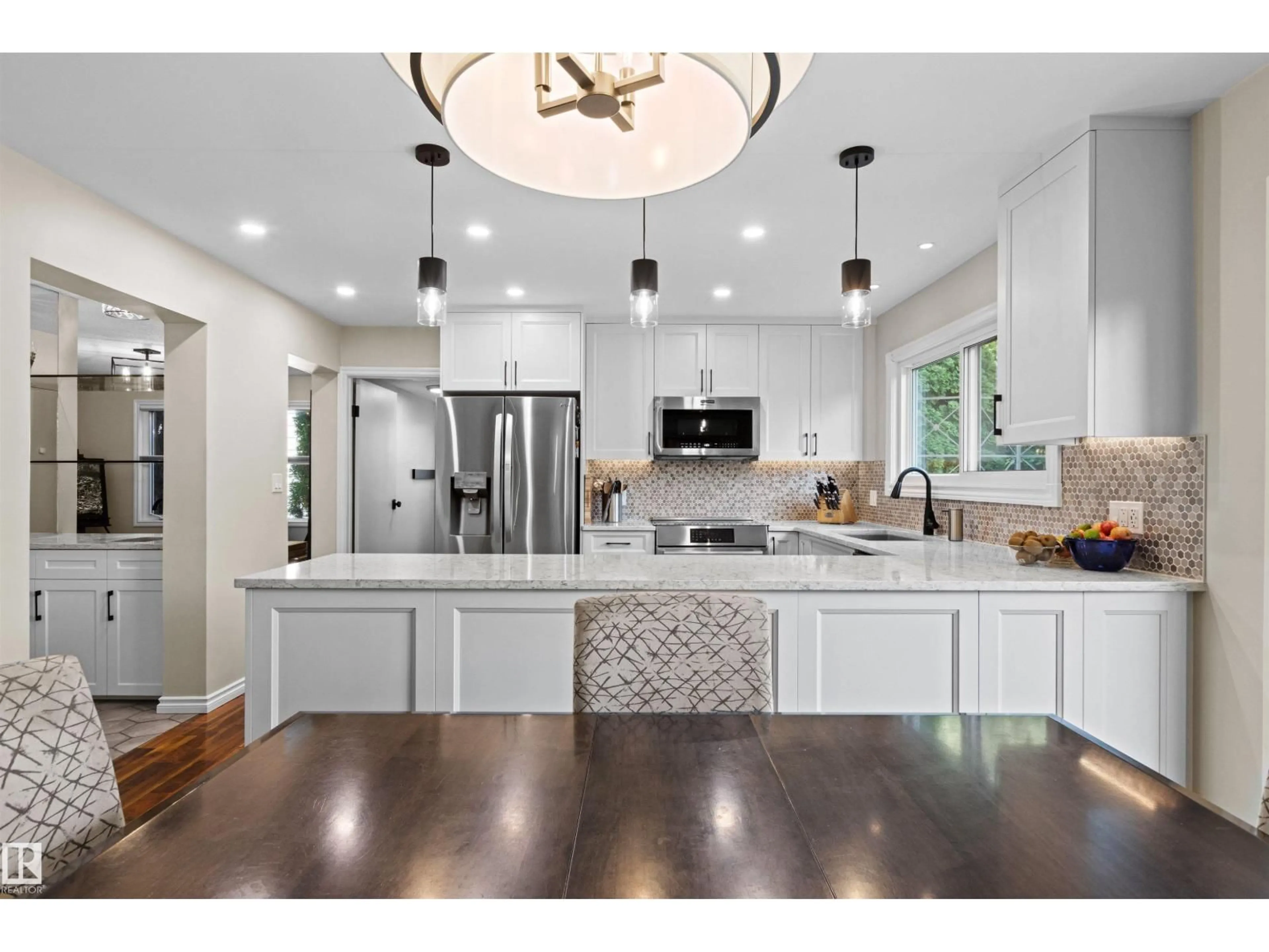 Open concept kitchen, ceramic/tile floor for 11118 23A AV, Edmonton Alberta T6J4N9