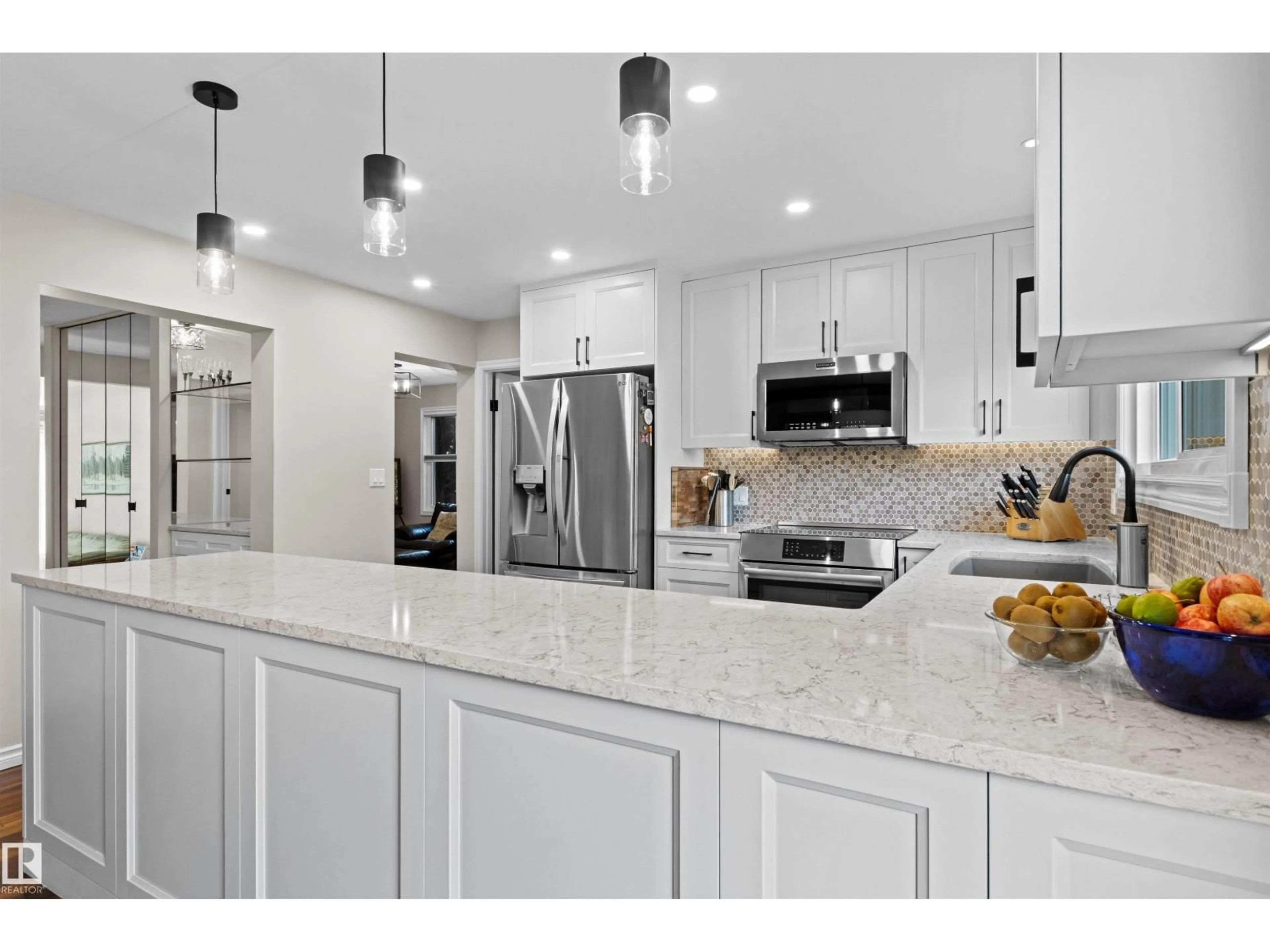 Open concept kitchen, ceramic/tile floor for 11118 23A AV, Edmonton Alberta T6J4N9