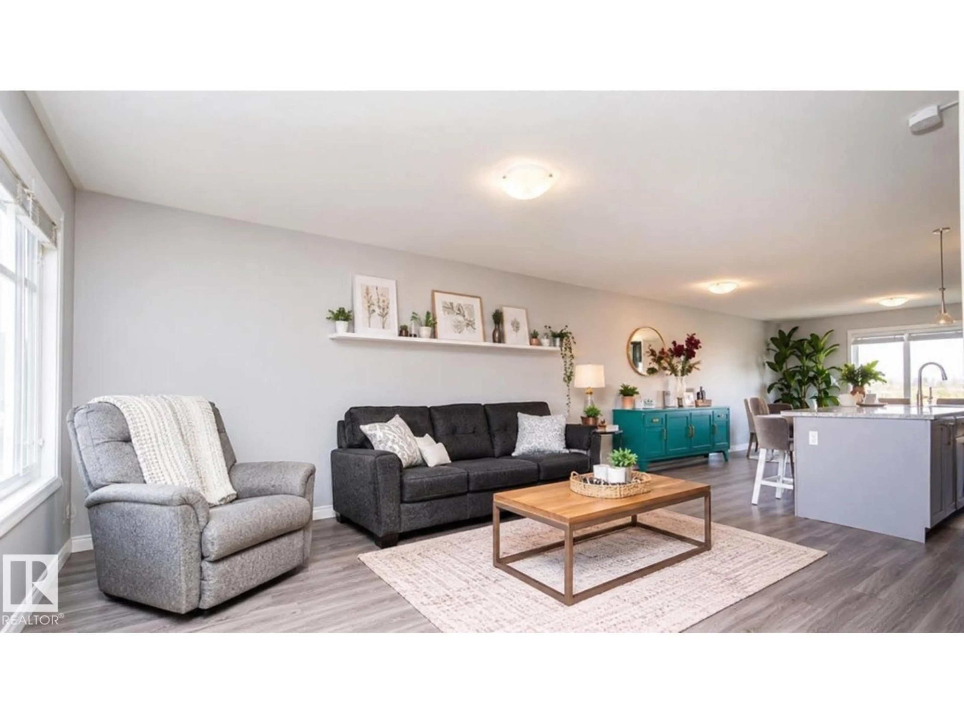 Living room with furniture, wood/laminate floor for 3040 CHECKNITA WY, Edmonton Alberta T6W3X8