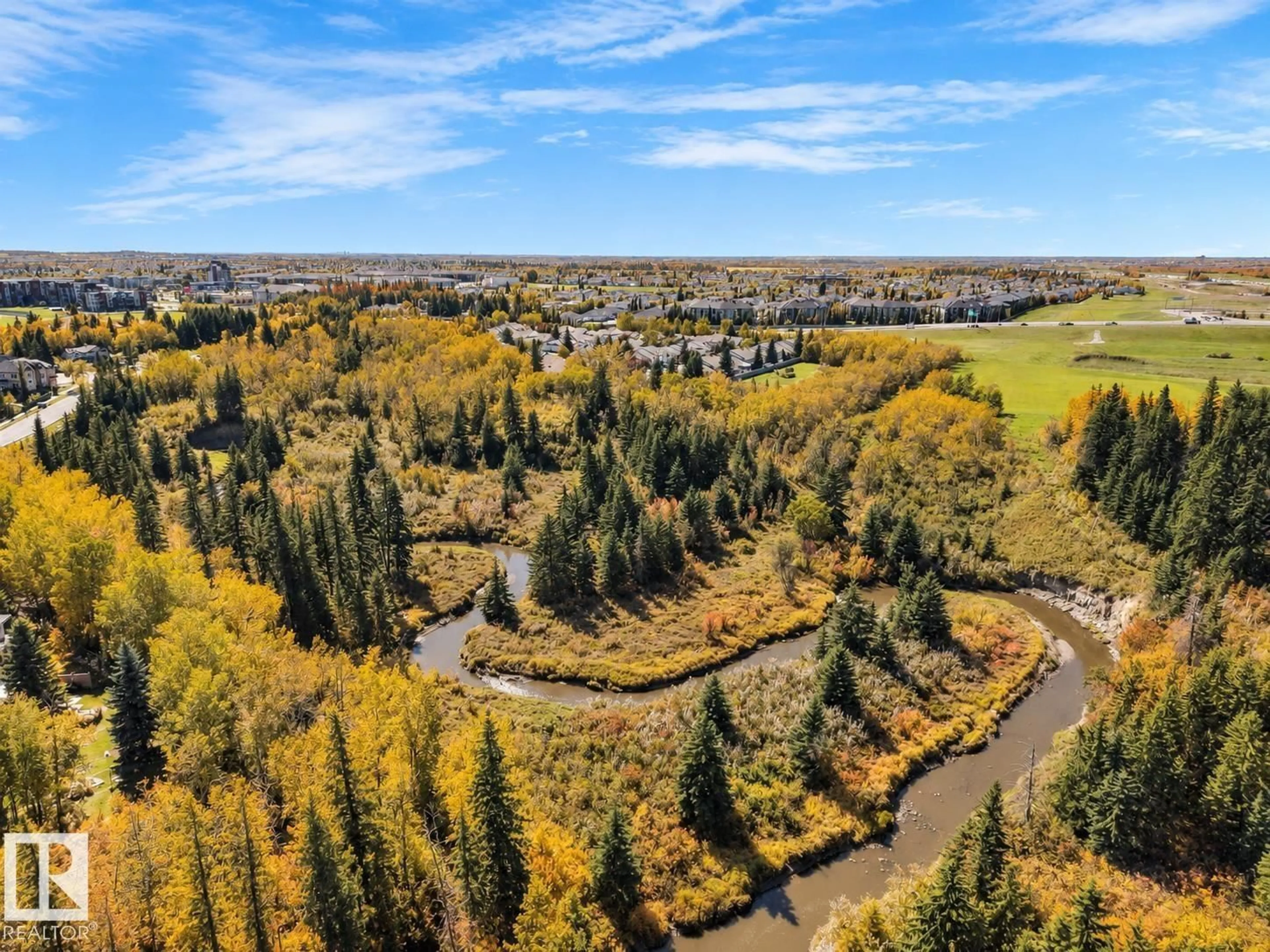 A pic from outside/outdoor area/front of a property/back of a property/a pic from drone, forest/trees view for #306 - 905 BLACKLOCK WY, Edmonton Alberta T6W1M7