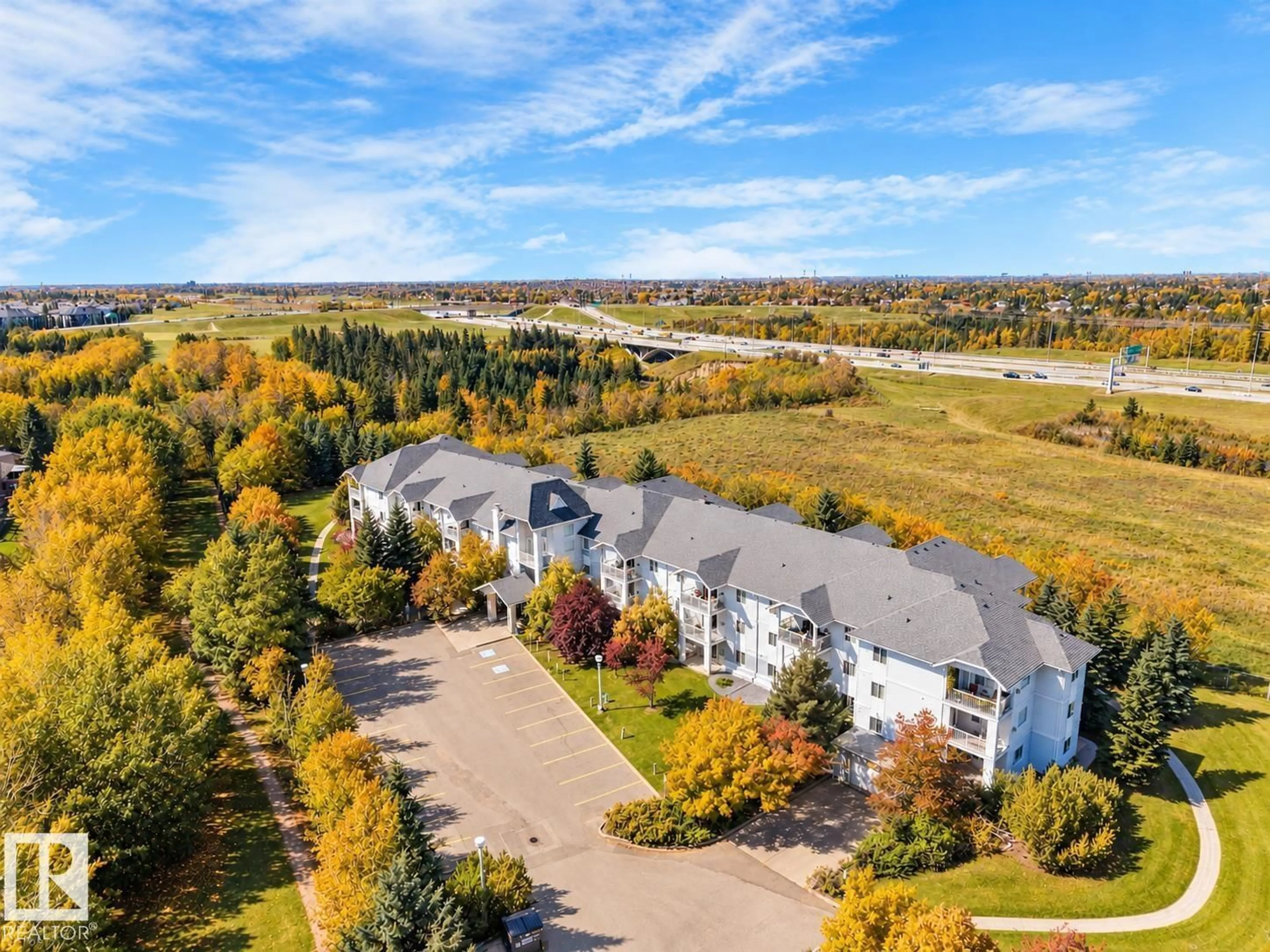 A pic from outside/outdoor area/front of a property/back of a property/a pic from drone, water/lake/river/ocean view for #306 - 905 BLACKLOCK WY, Edmonton Alberta T6W1M7