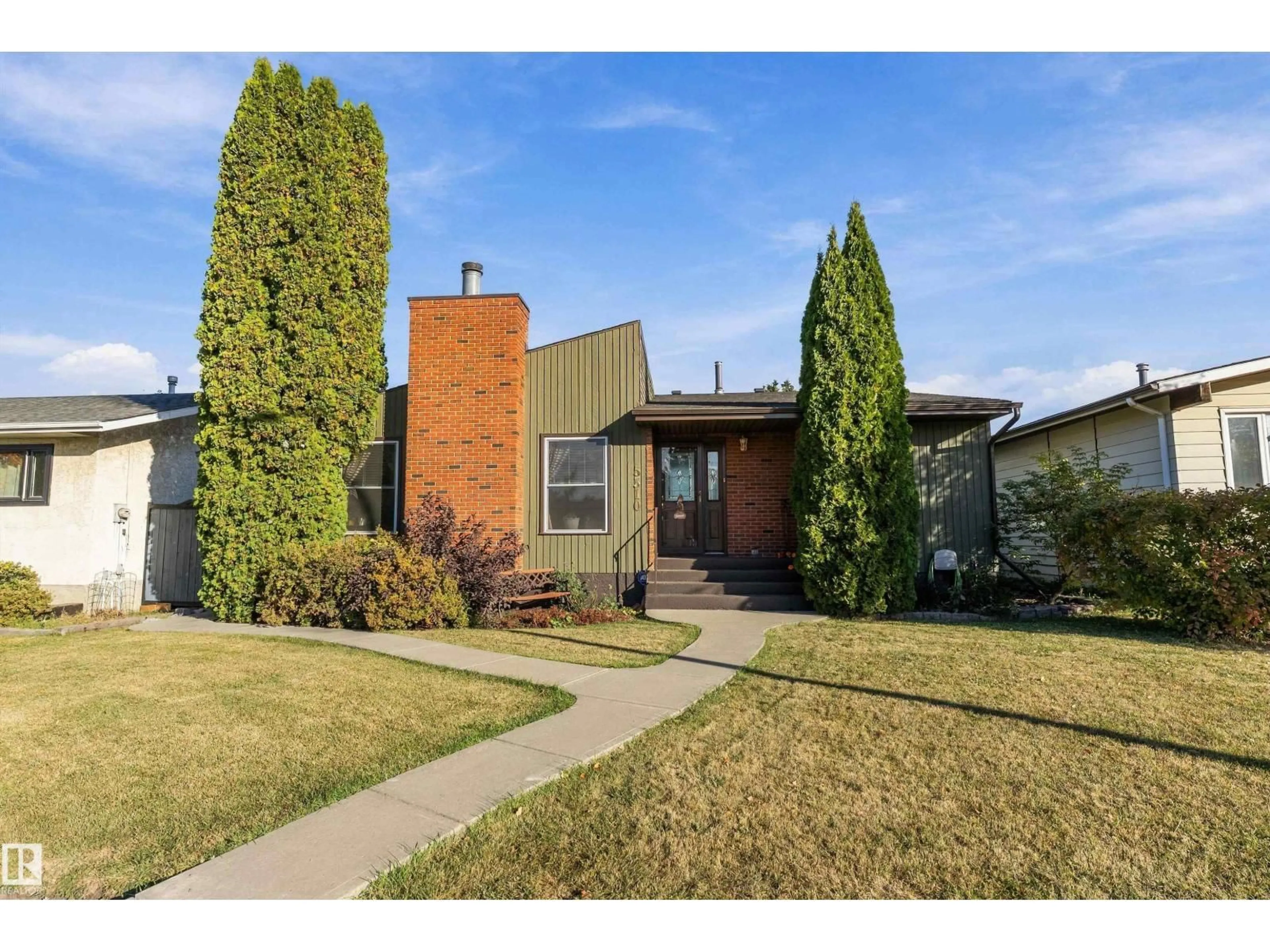 Home with brick exterior material, street for NW - 5310 18A AV, Edmonton Alberta T6L1J8