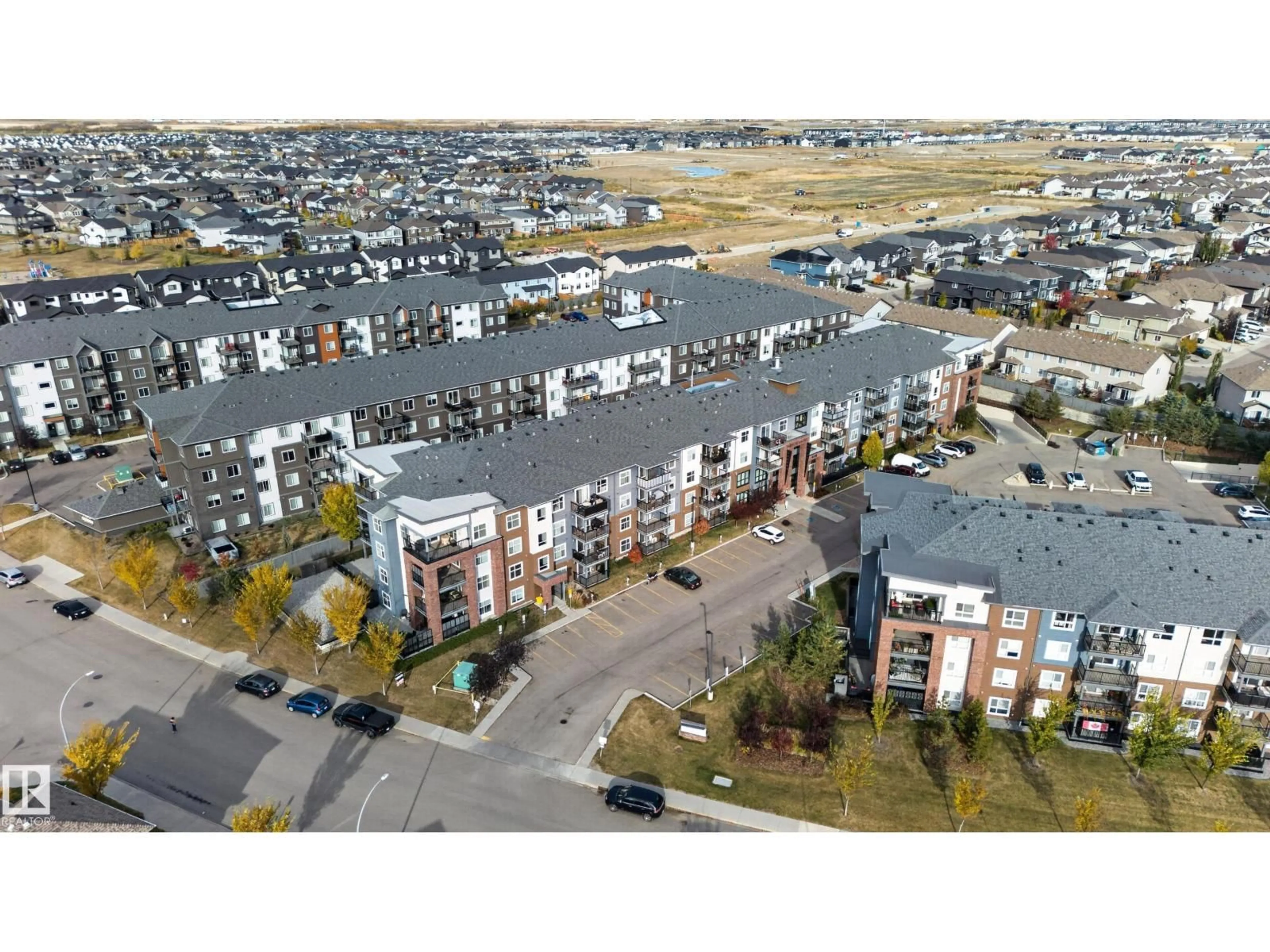 A pic from outside/outdoor area/front of a property/back of a property/a pic from drone, unknown for #113 - 5510 SCHONSEE DR, Edmonton Alberta T5Z0N9