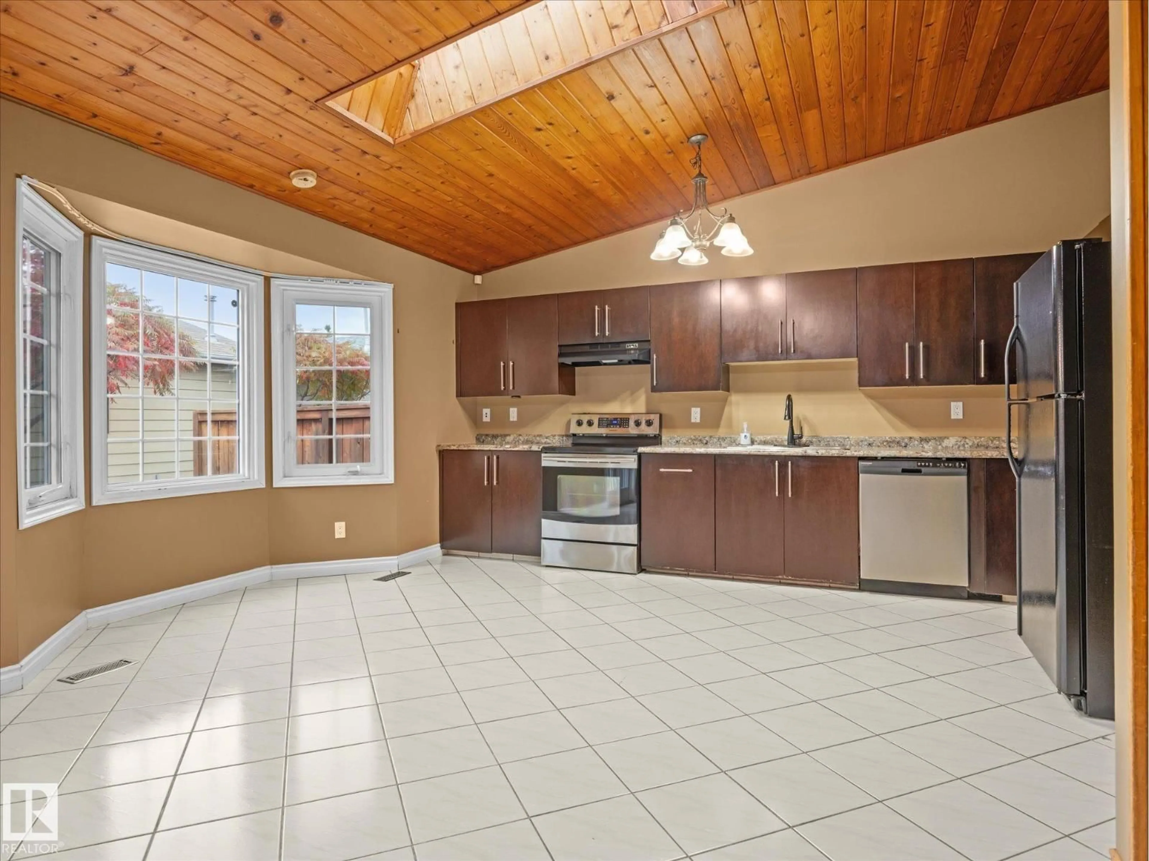 Open concept kitchen, ceramic/tile floor for 13844 30 ST, Edmonton Alberta T5Y1M5
