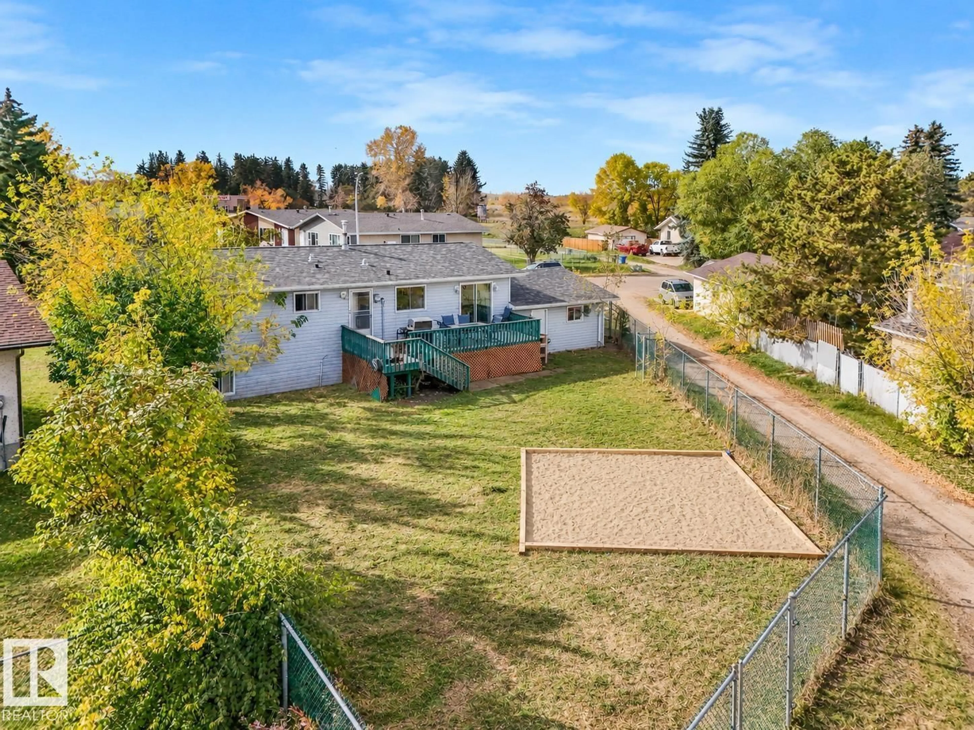 A pic from outside/outdoor area/front of a property/back of a property/a pic from drone, mountain view for 5535 55A ST, Wetaskiwin Alberta T9A2A7