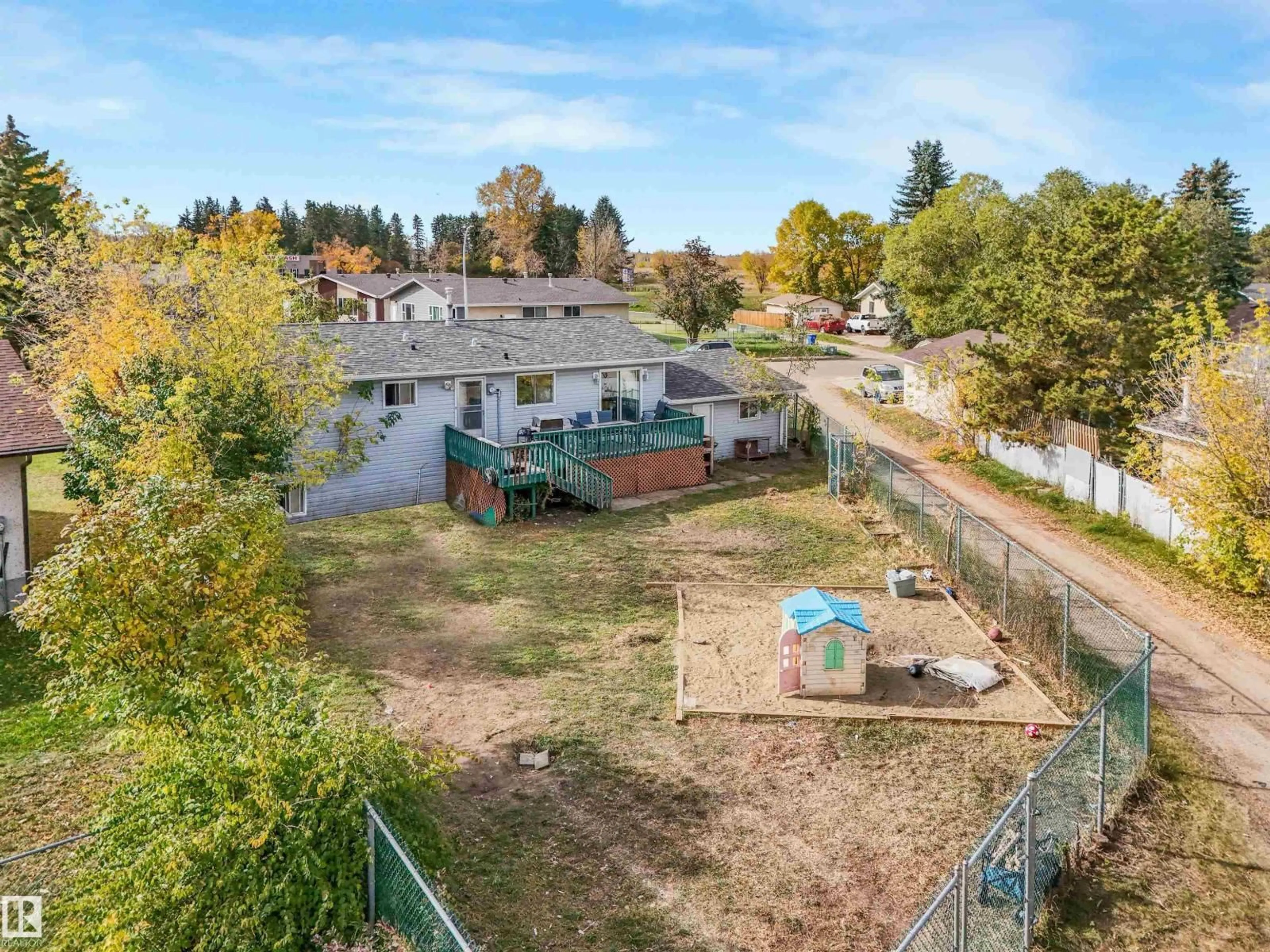 A pic from outside/outdoor area/front of a property/back of a property/a pic from drone, water/lake/river/ocean view for 5535 55A ST, Wetaskiwin Alberta T9A2A7