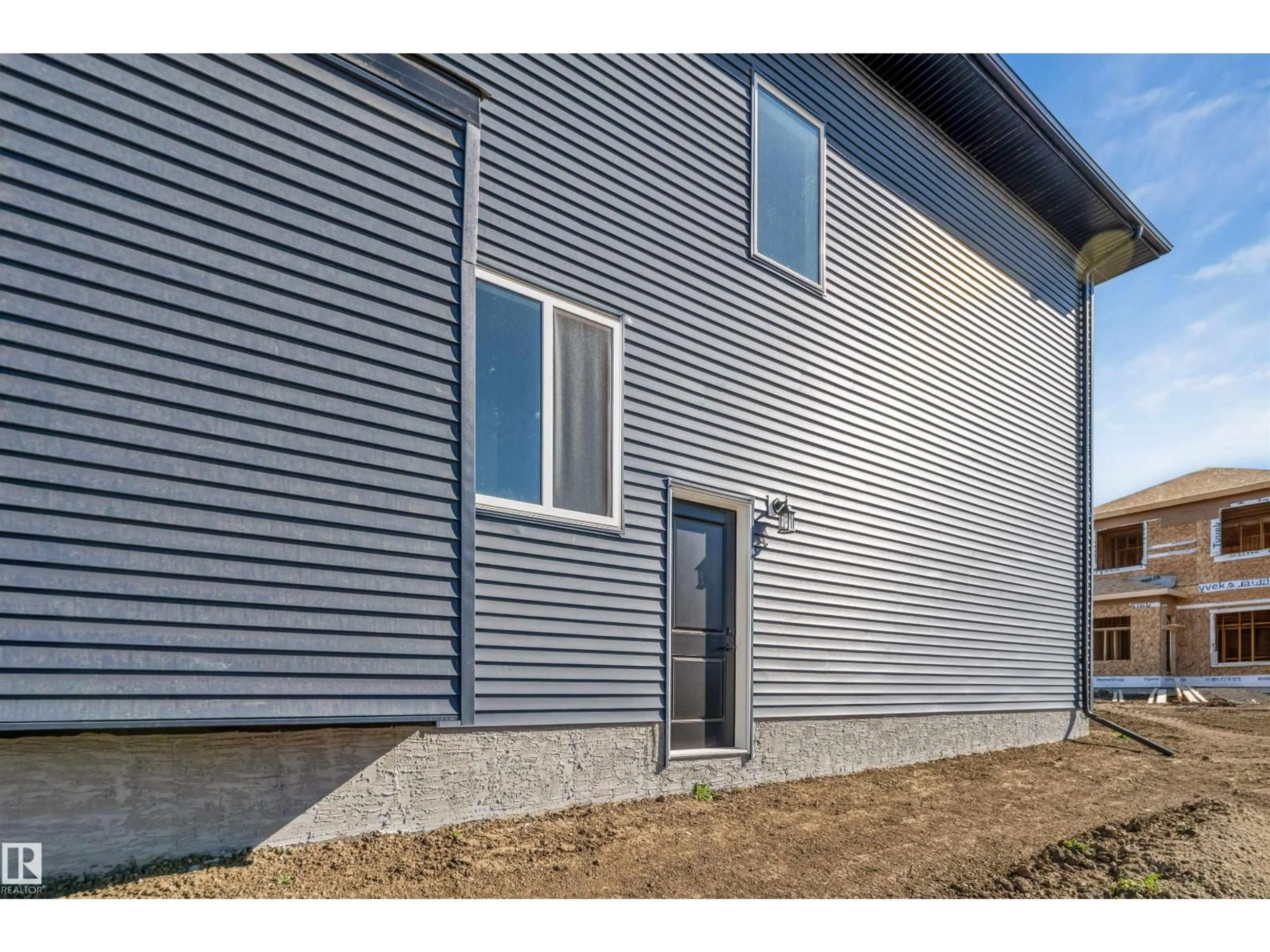 Home with vinyl exterior material, building for 4707 17 AV, Edmonton Alberta T6X1Y4