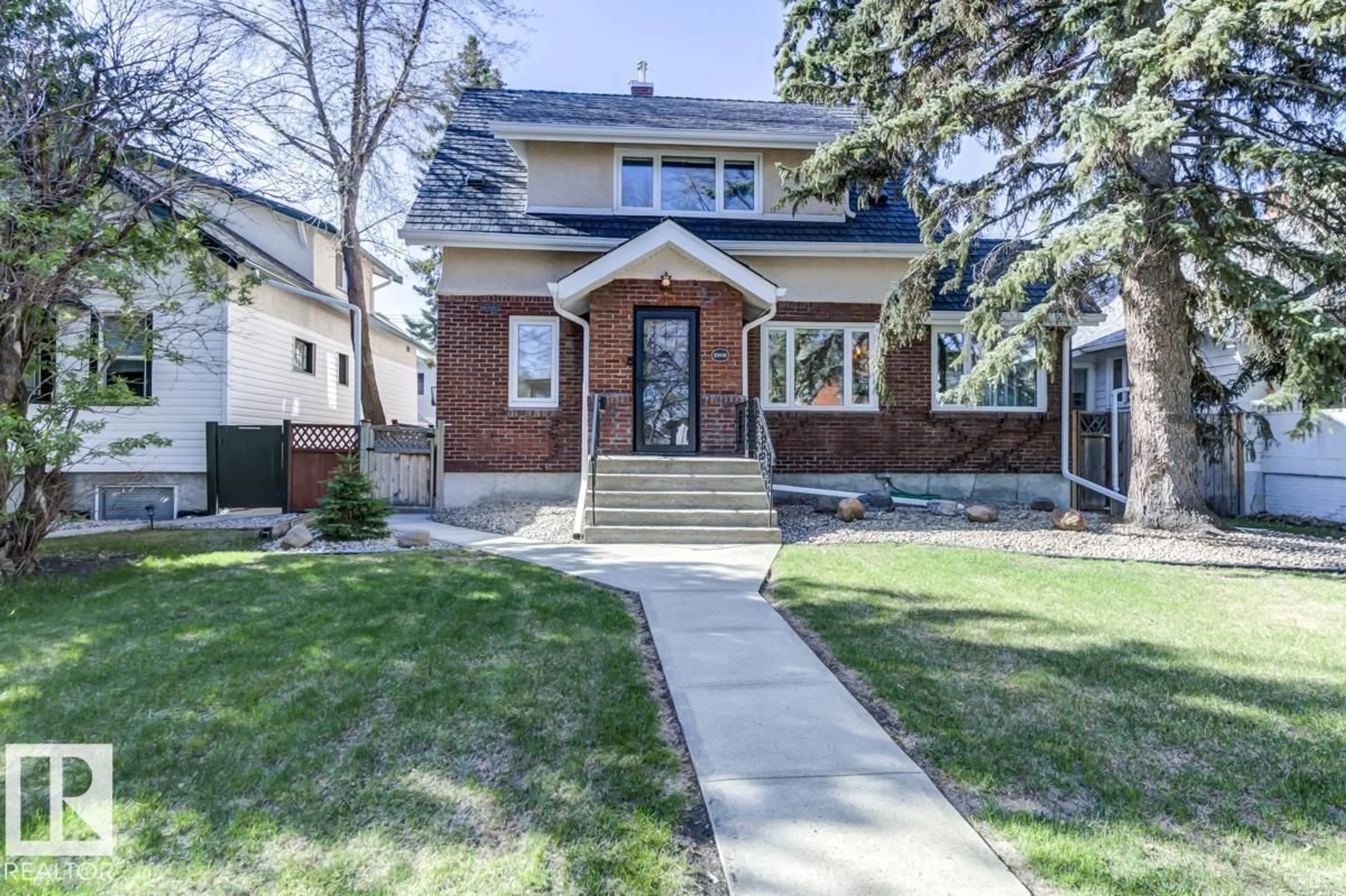 Home with brick exterior material, street for 10949 88 AV, Edmonton Alberta T6G0Y9