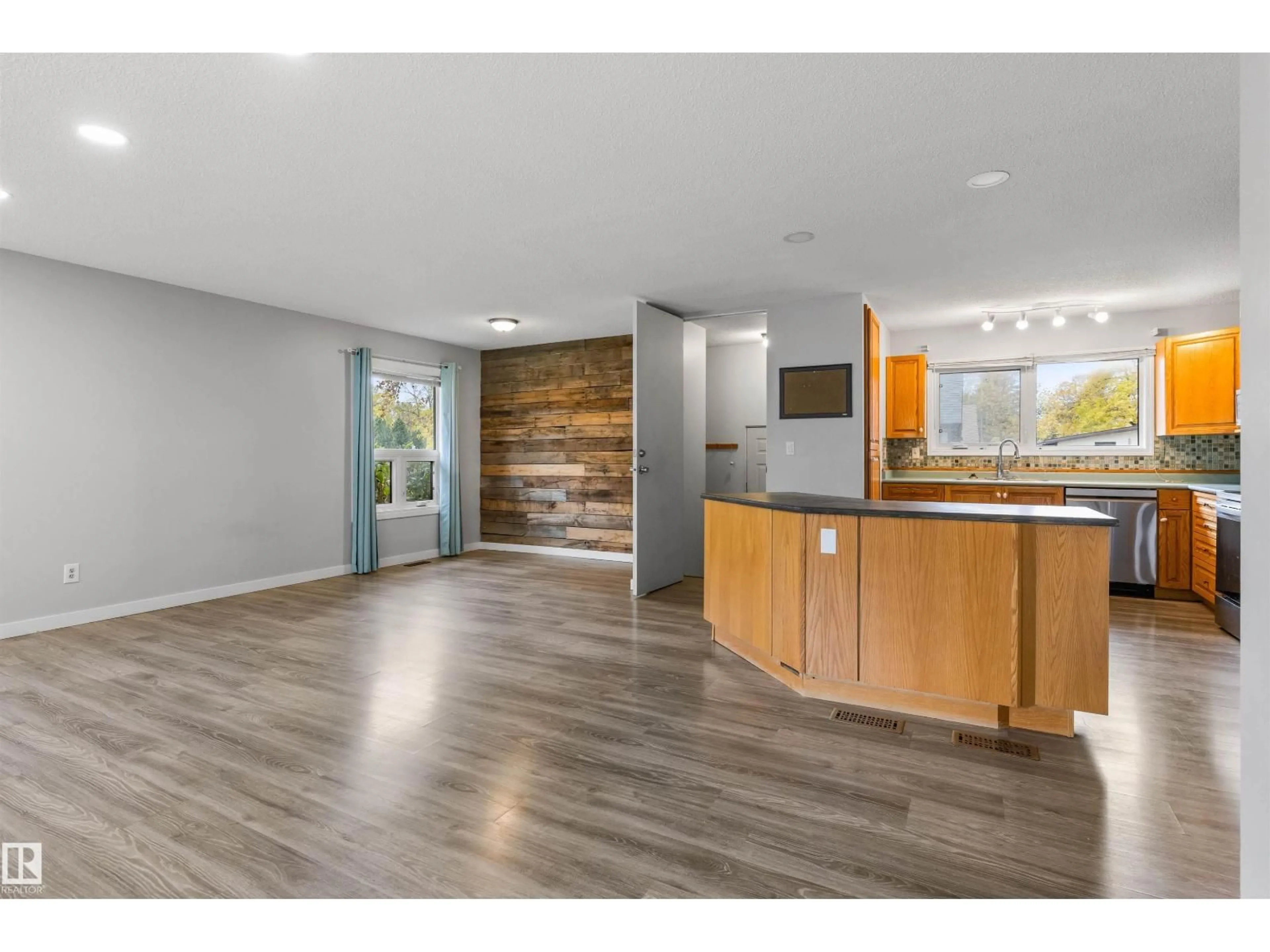 Open concept kitchen, wood/laminate floor for 1 LLOYD PL, St. Albert Alberta T8N2H4