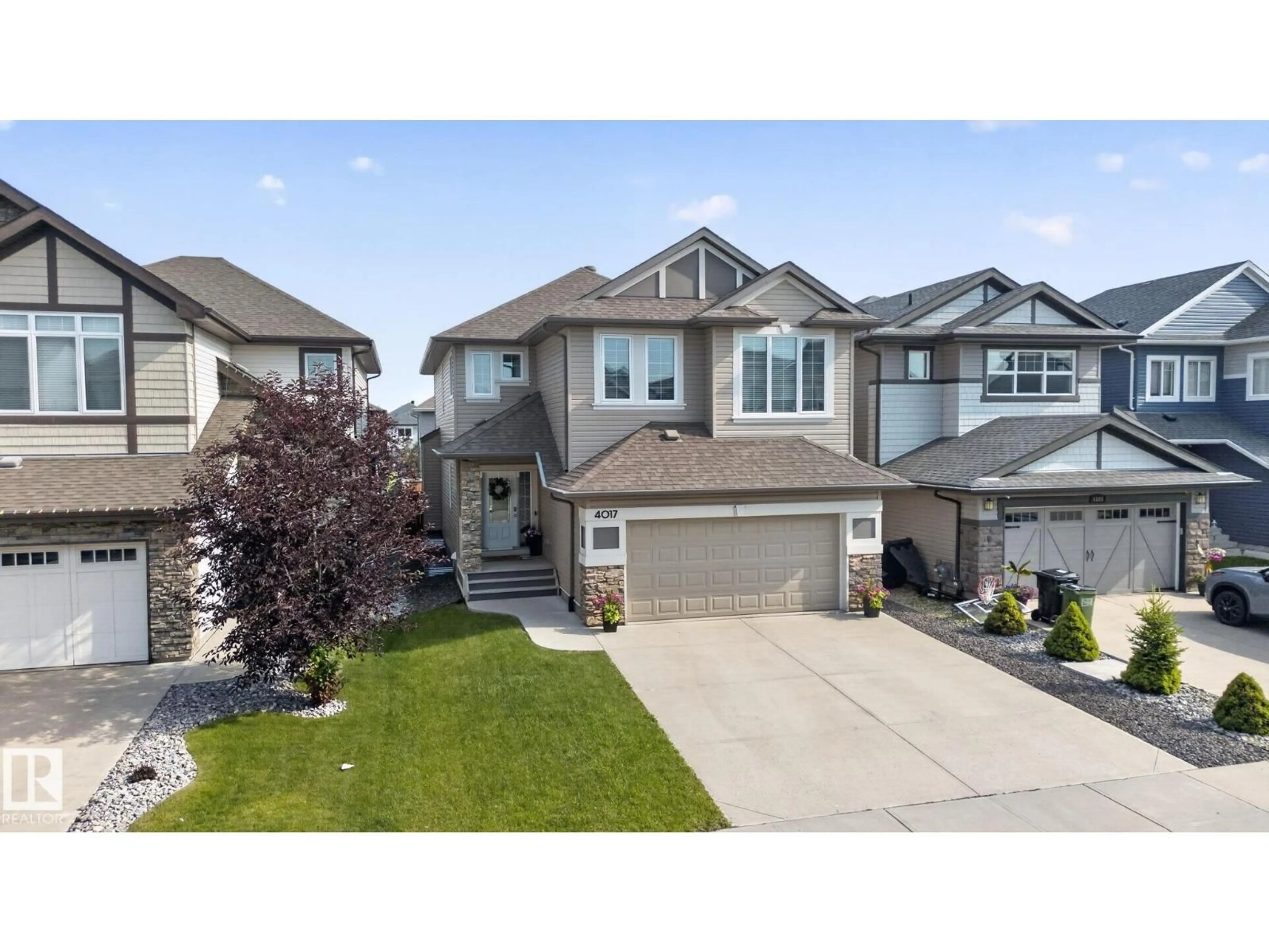 A pic from outside/outdoor area/front of a property/back of a property/a pic from drone, street for 4017 171A AV, Edmonton Alberta T5Y0Z4