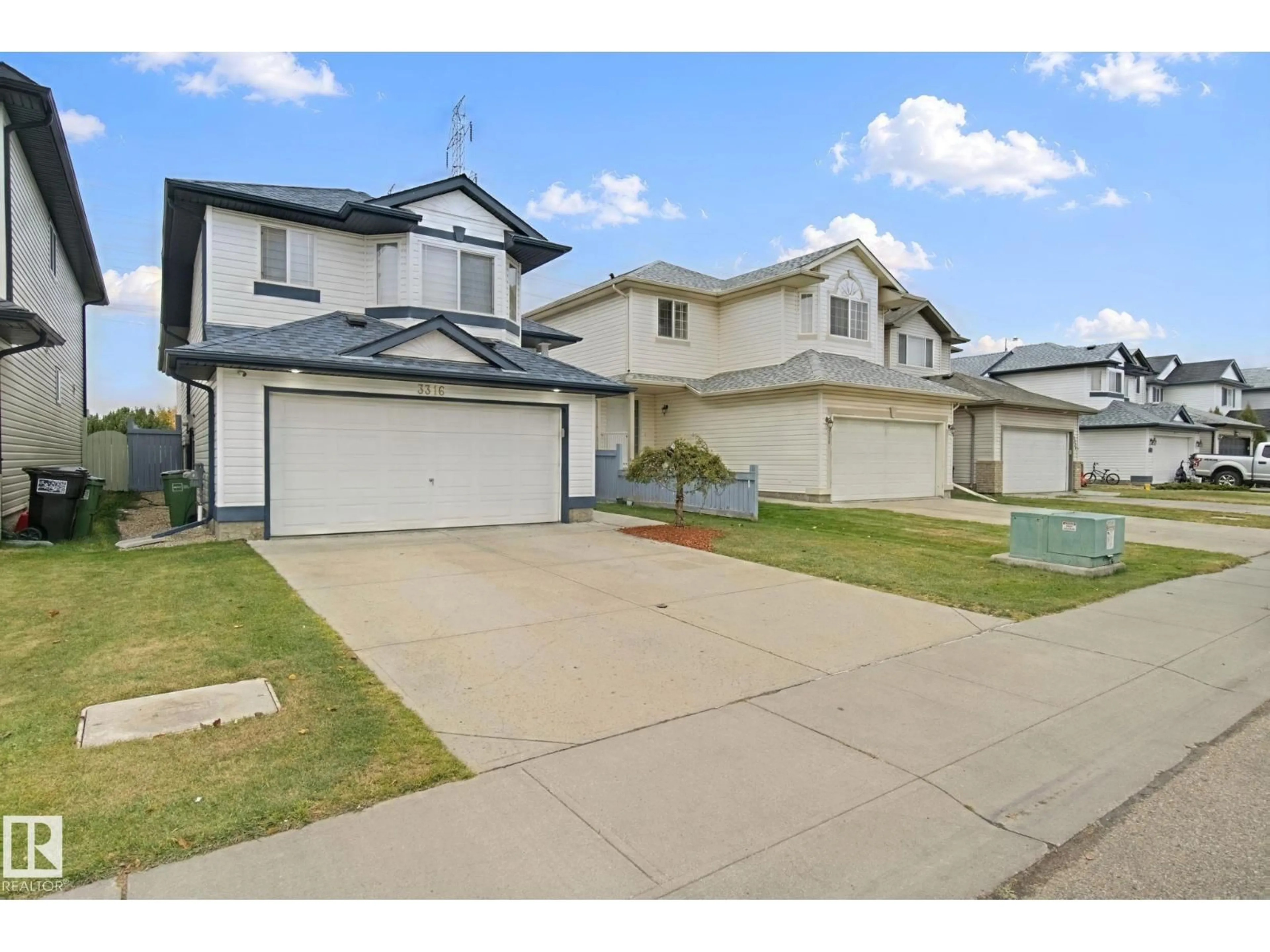 A pic from outside/outdoor area/front of a property/back of a property/a pic from drone, street for 3316 26 ST, Edmonton Alberta T6T1Z3
