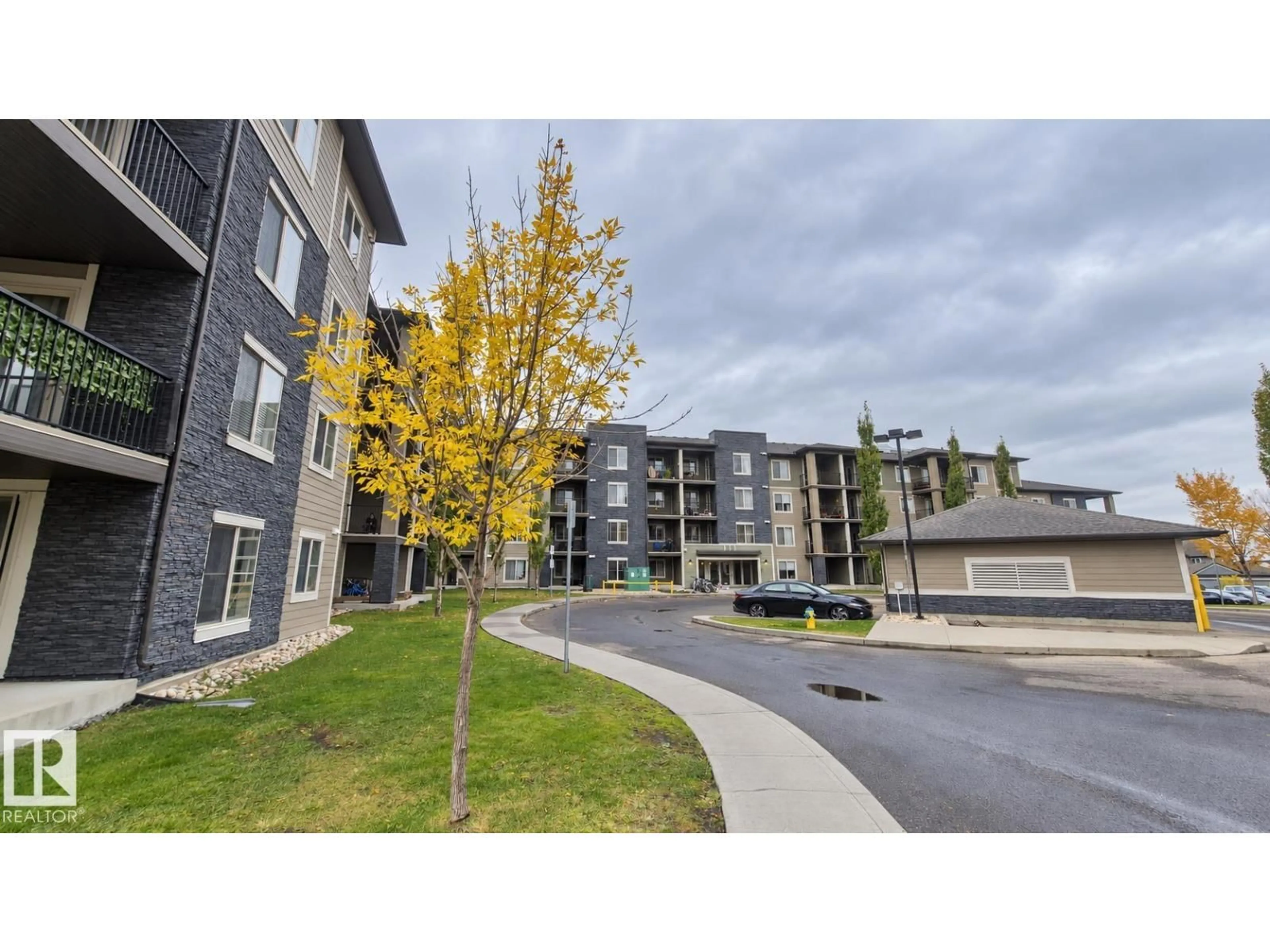 A pic from outside/outdoor area/front of a property/back of a property/a pic from drone, street for 111 - 119 WATT CM, Edmonton Alberta T6X2C6