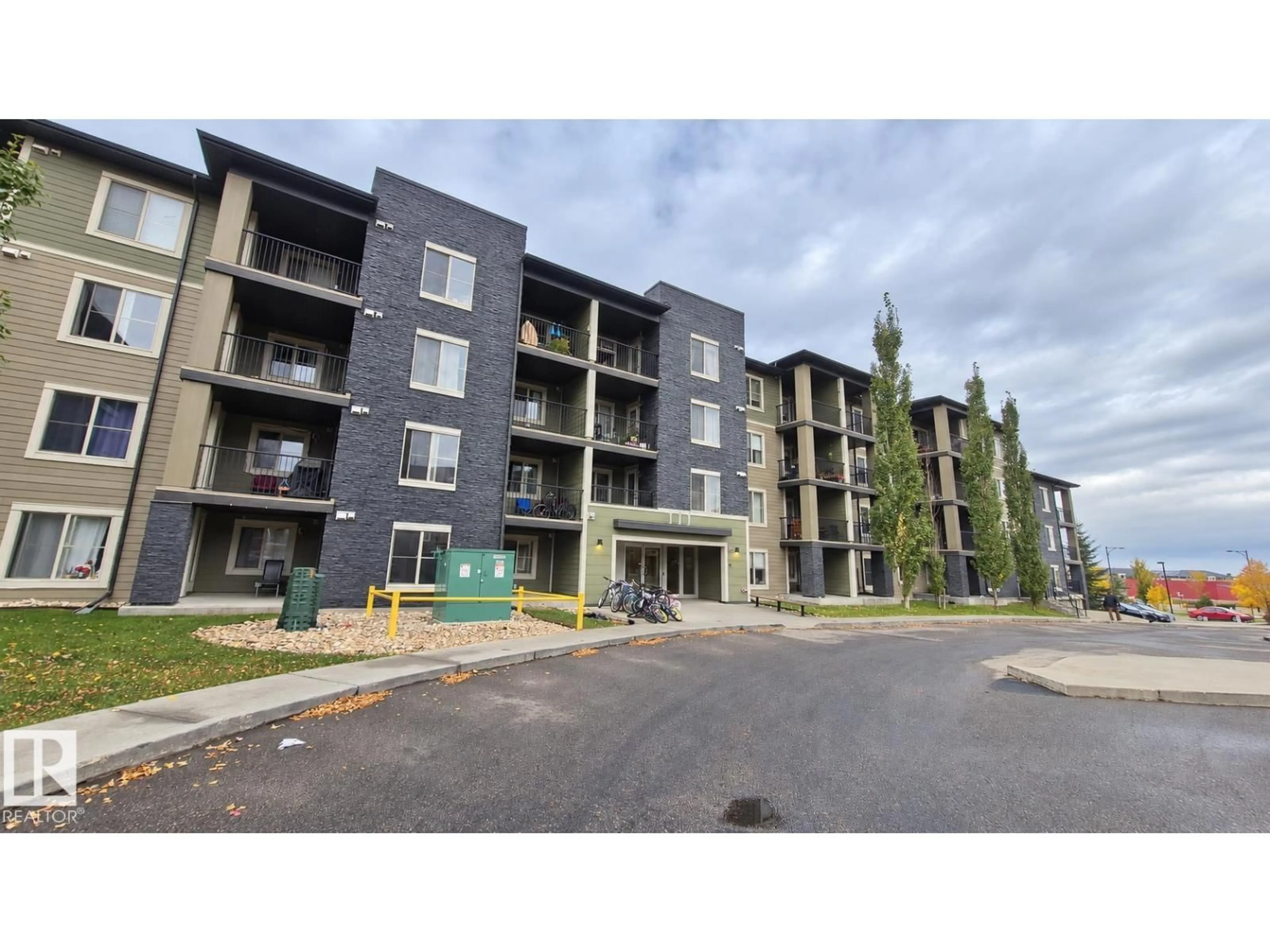 A pic from outside/outdoor area/front of a property/back of a property/a pic from drone, unknown for 111 - 119 WATT CM, Edmonton Alberta T6X2C6
