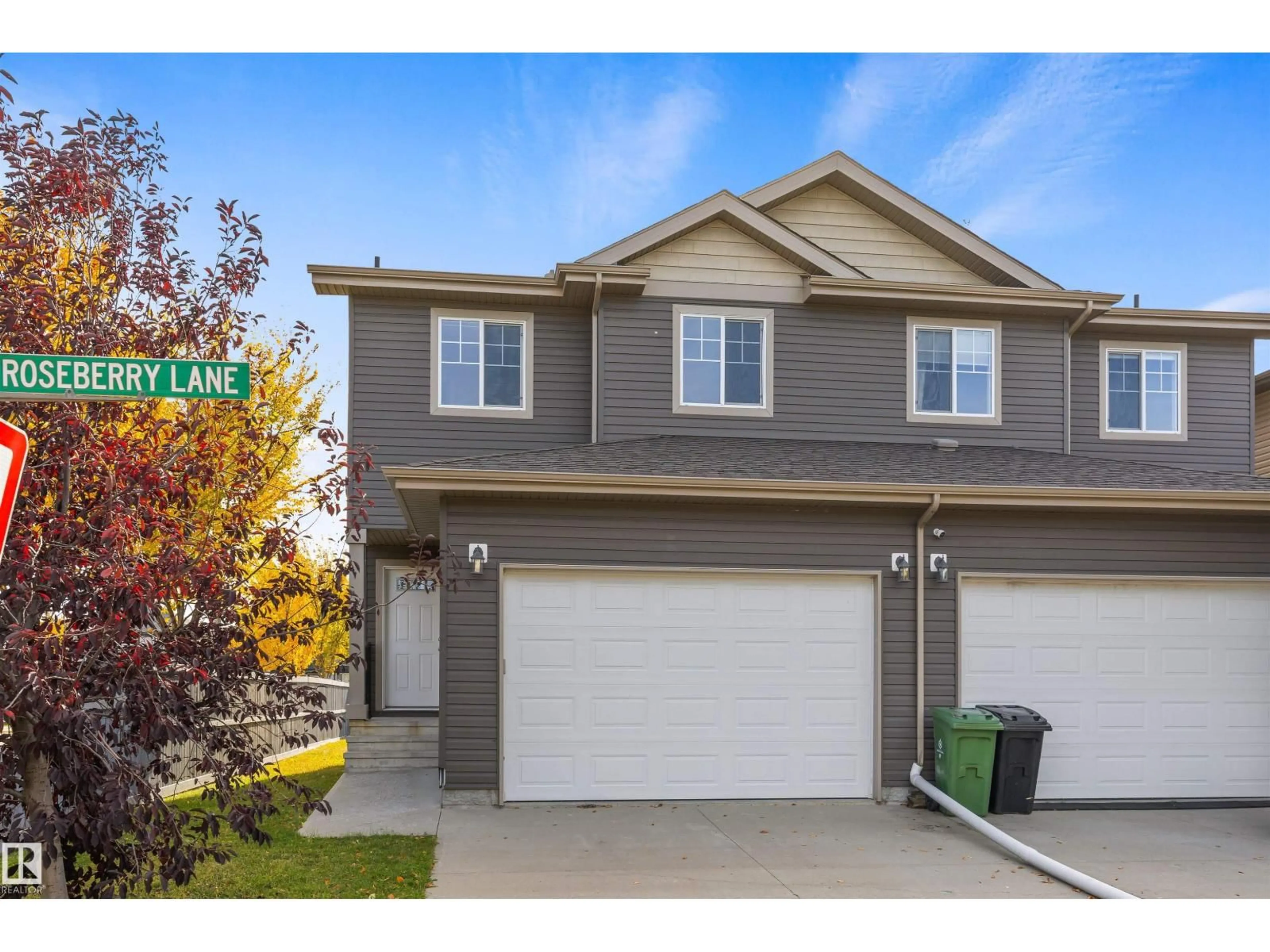 Home with vinyl exterior material, street for 1 ROSEBERRY LN, Fort Saskatchewan Alberta T8L0M6