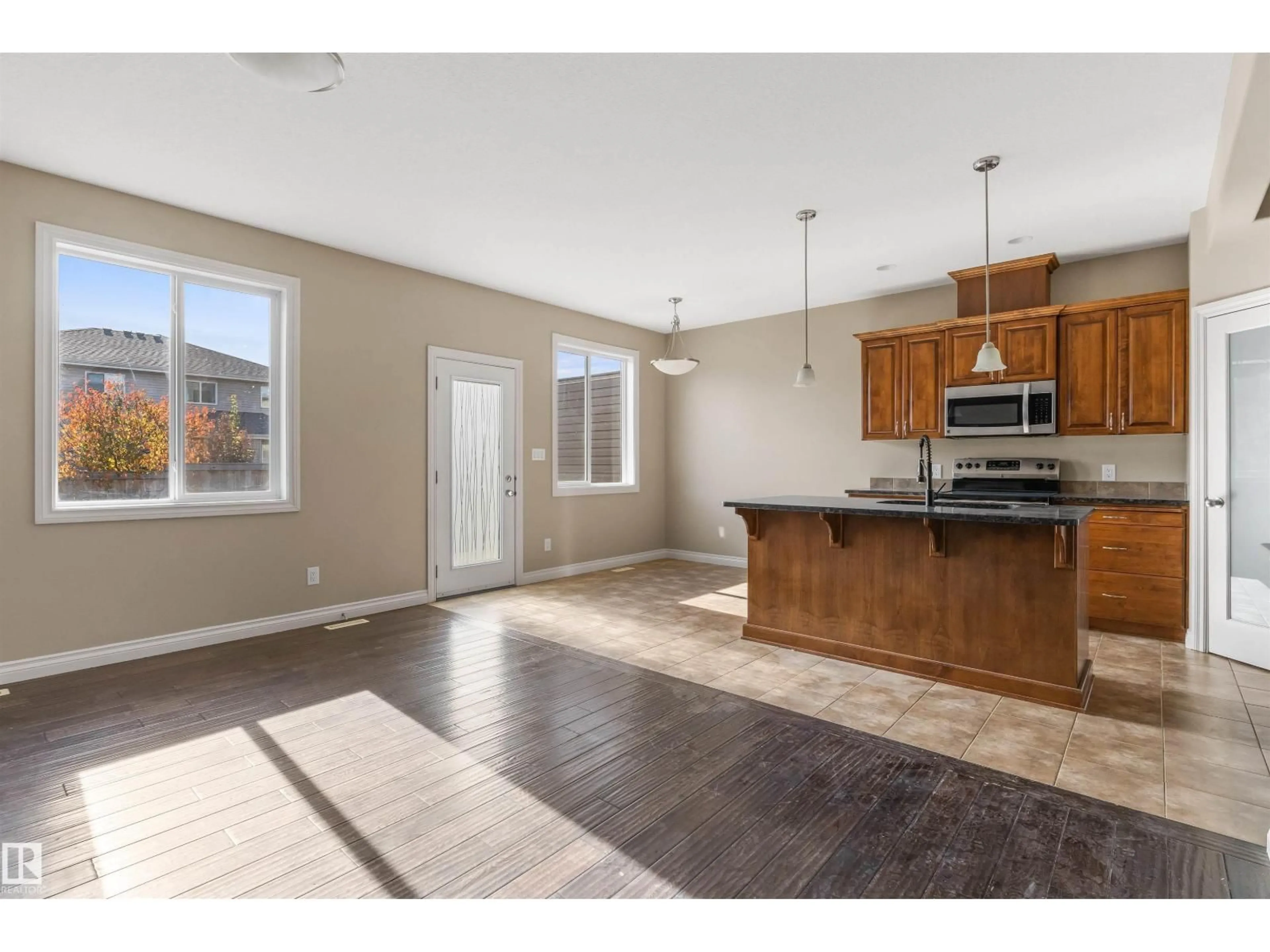 Open concept kitchen, unknown for 1 ROSEBERRY LN, Fort Saskatchewan Alberta T8L0M6