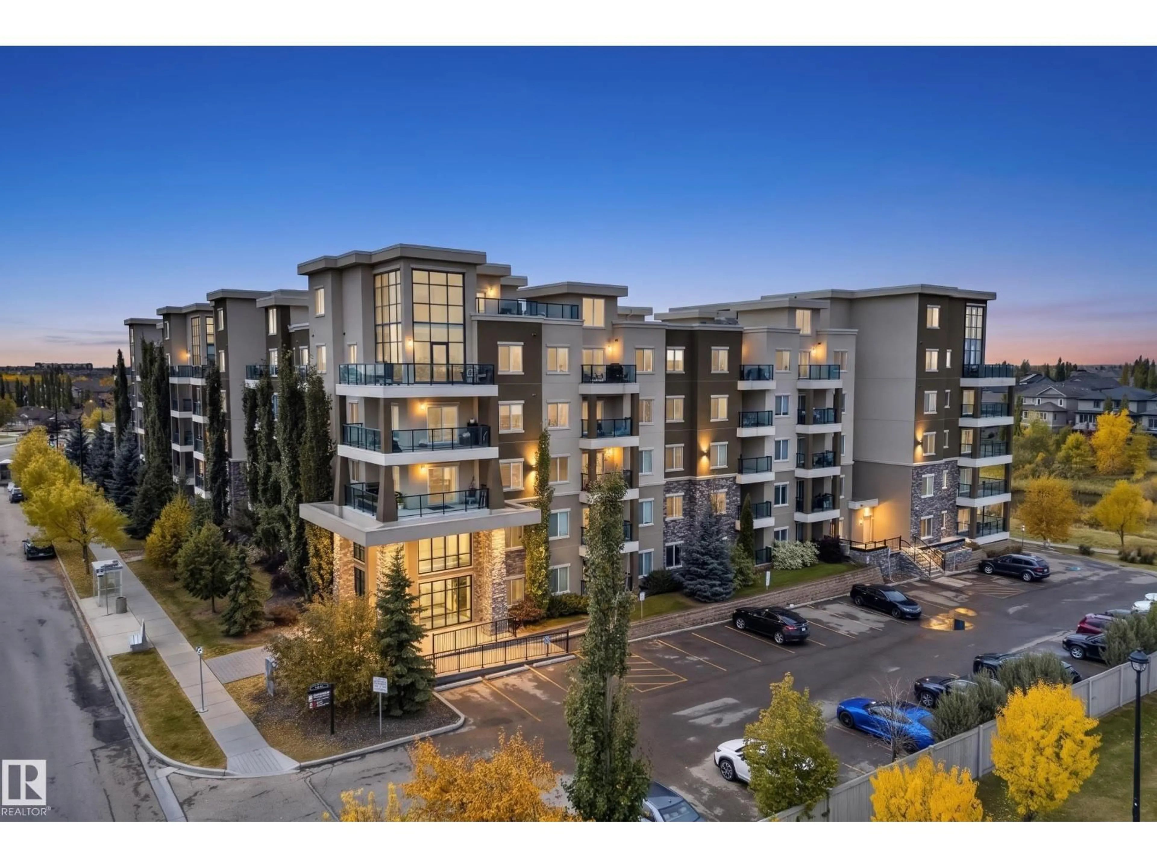 A pic from outside/outdoor area/front of a property/back of a property/a pic from drone, unknown for 505 - 1230 WINDERMERE WY, Edmonton Alberta T6W2J3