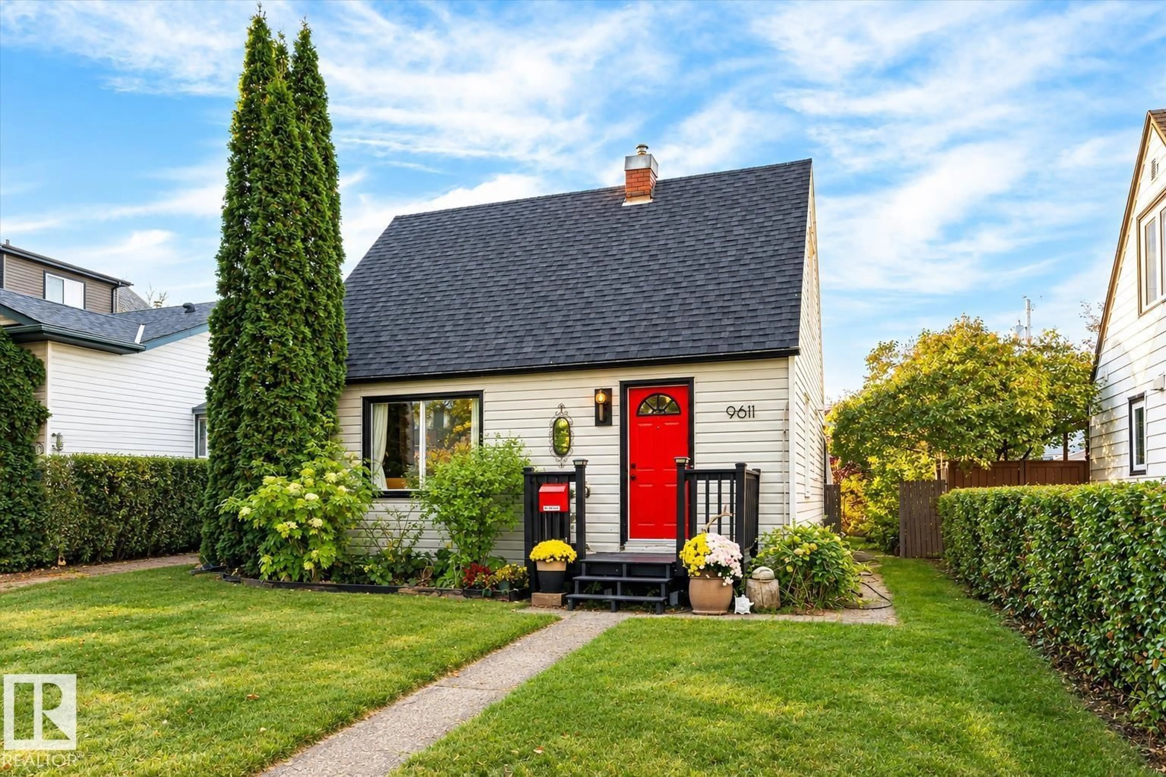Home with vinyl exterior material, street for 9611 73 AV, Edmonton Alberta T6E1B3