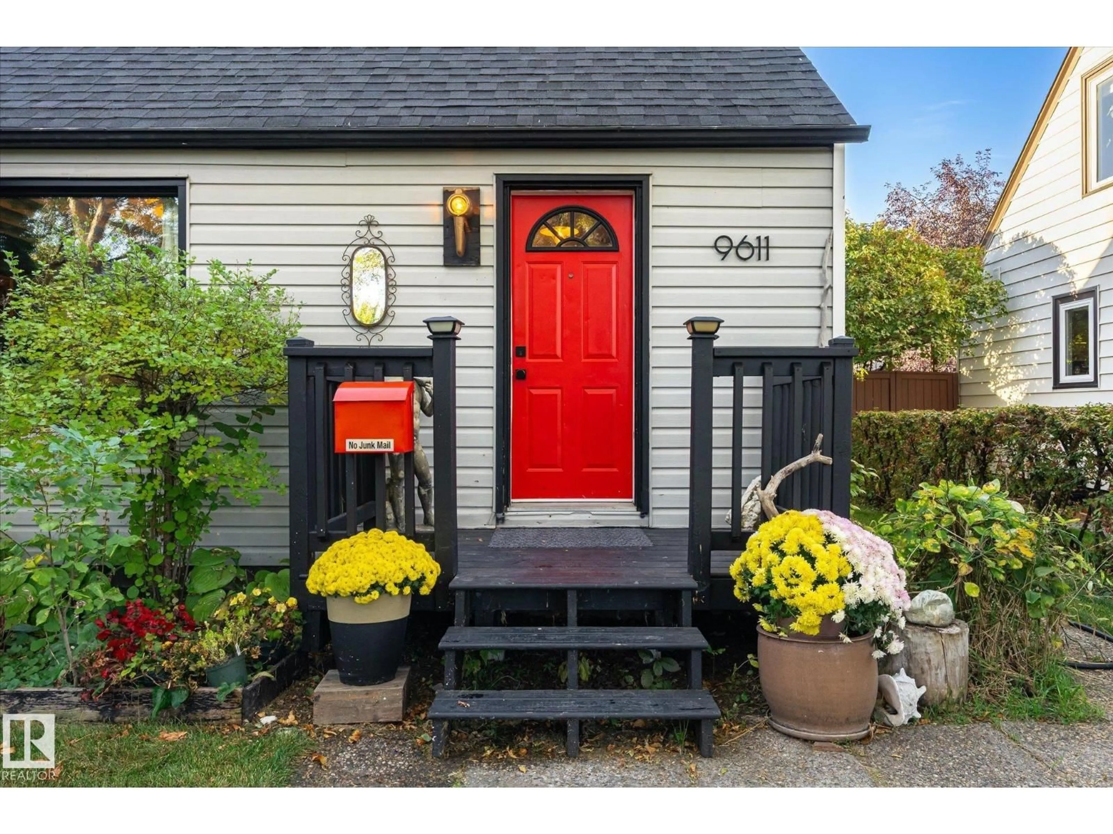 Home with vinyl exterior material, street for 9611 73 AV, Edmonton Alberta T6E1B3