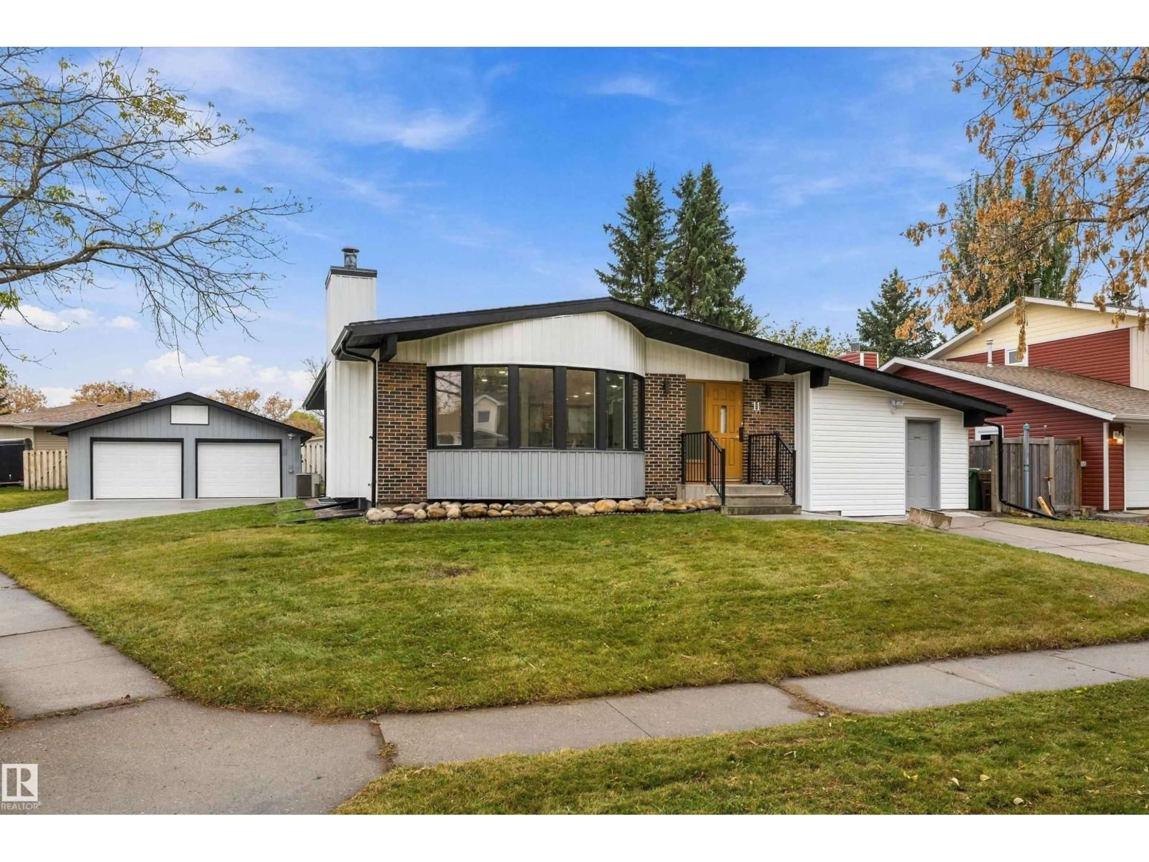 Home with vinyl exterior material, street for 11 AUSTIN CR, St. Albert Alberta T8N3B4
