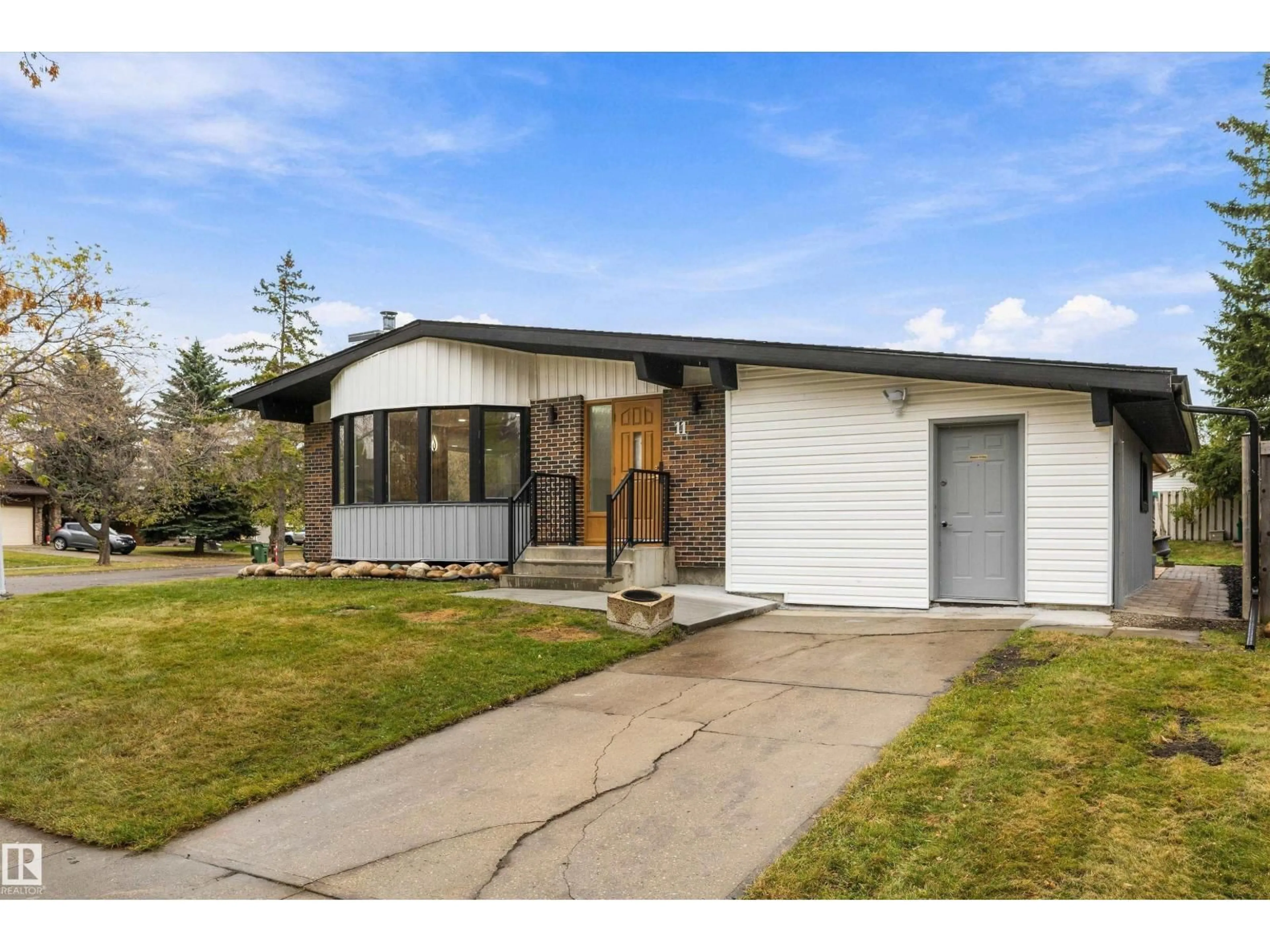 Home with vinyl exterior material, street for 11 AUSTIN CR, St. Albert Alberta T8N3B4