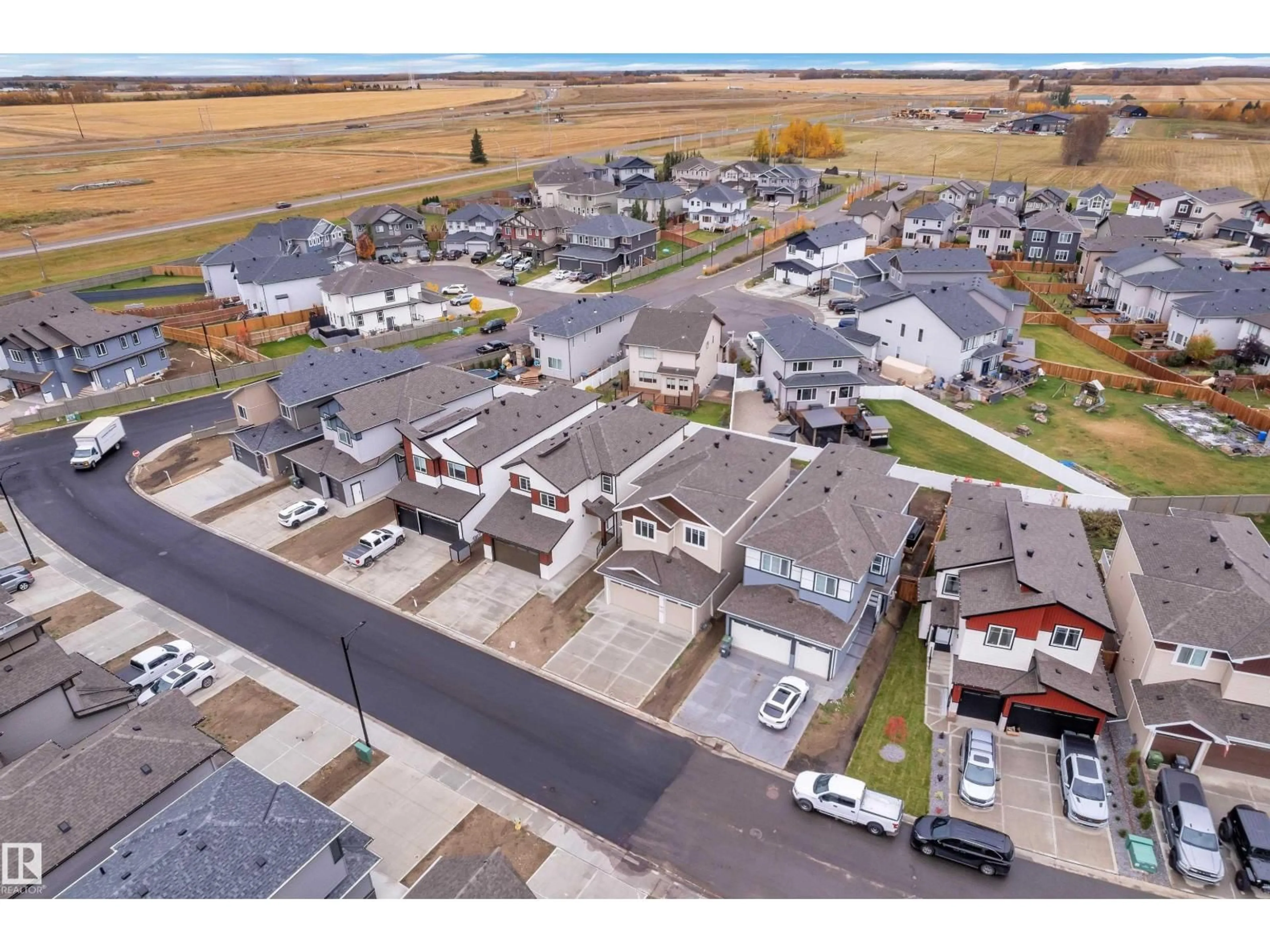 A pic from outside/outdoor area/front of a property/back of a property/a pic from drone, street for 737 ASTORIA WY, Devon Alberta T9G0M7