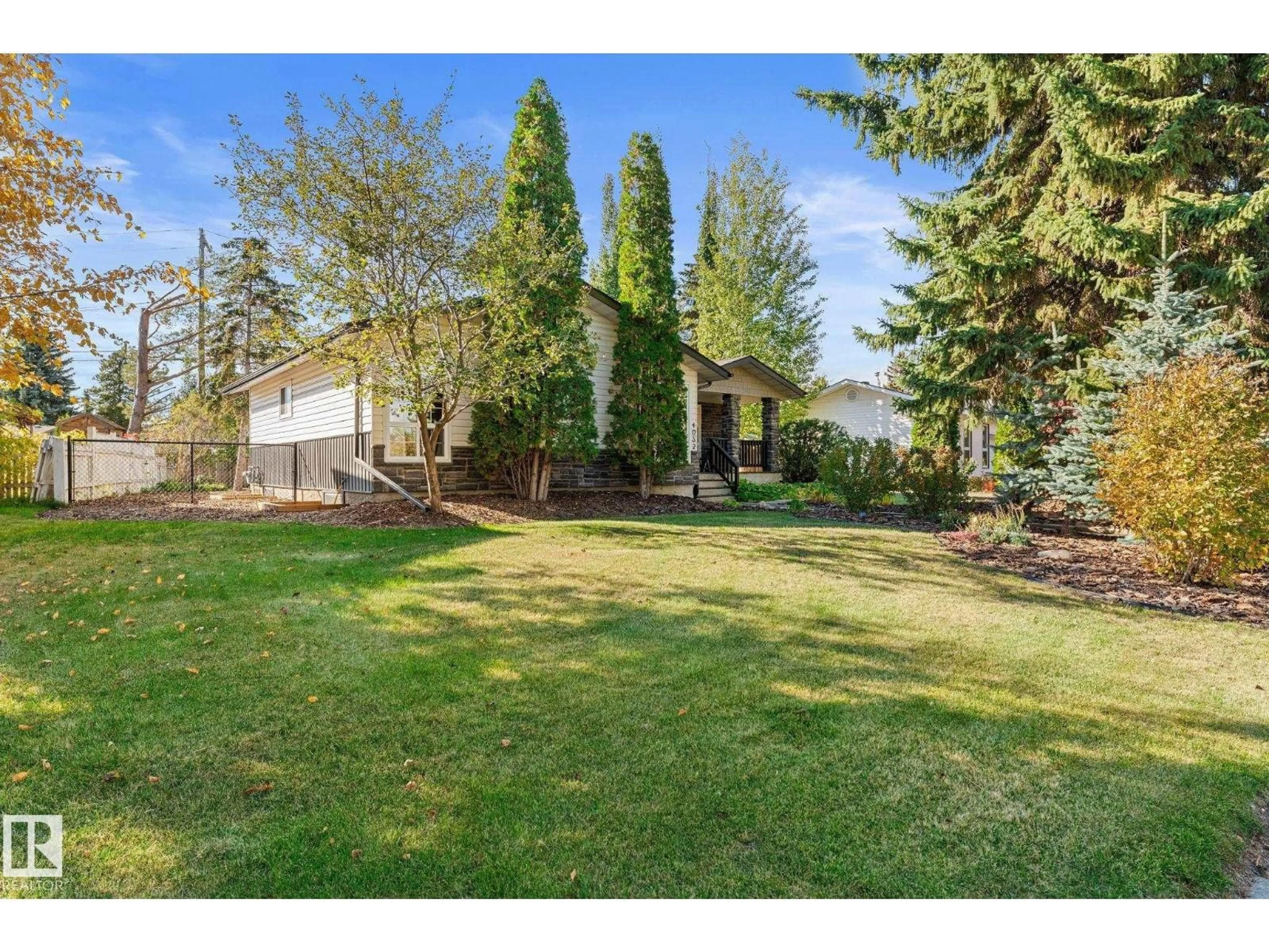 A pic from outside/outdoor area/front of a property/back of a property/a pic from drone, unknown for NW - 4032 121 ST, Edmonton Alberta T6J1Y5