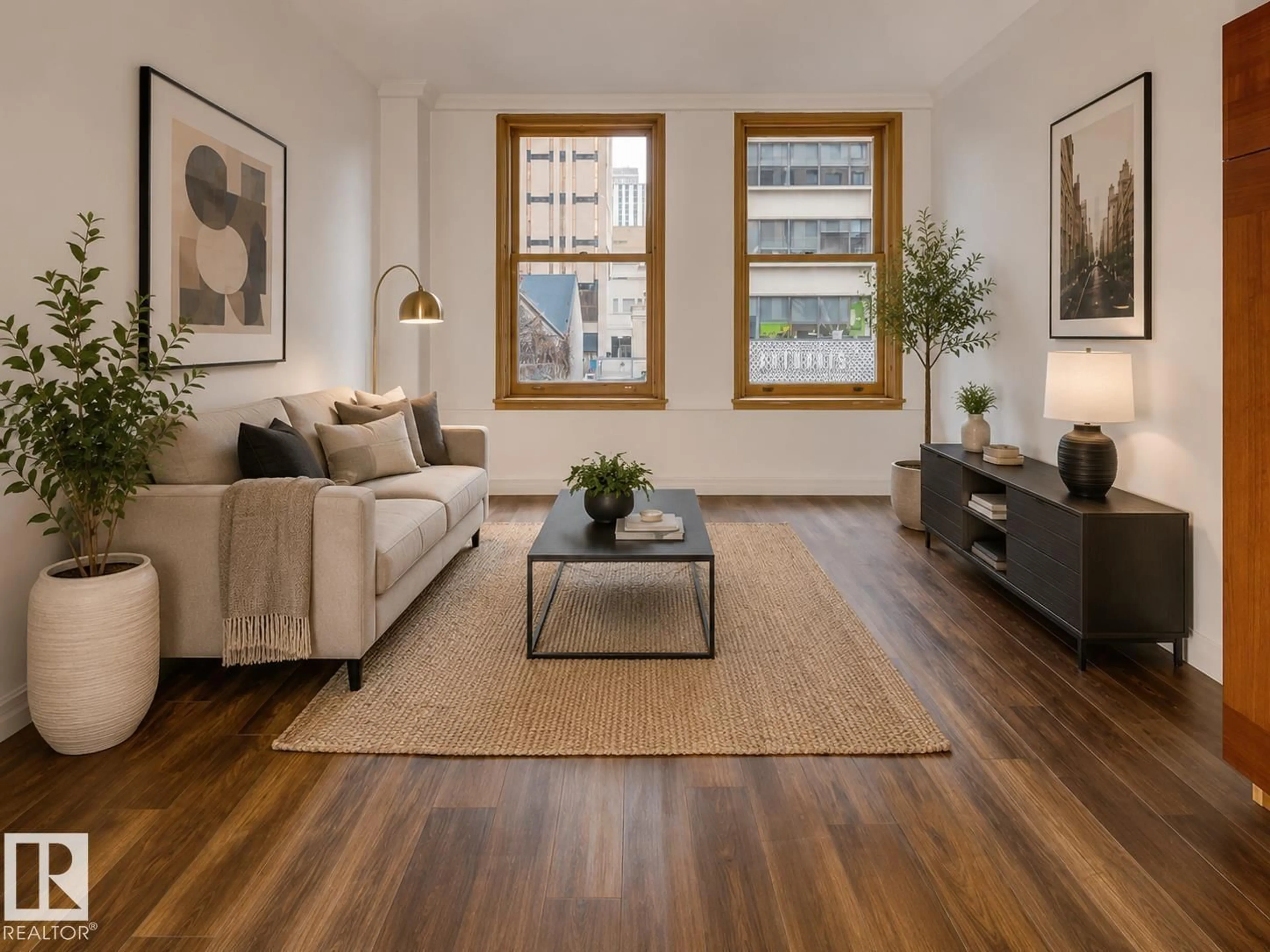 Living room with furniture, wood/laminate floor for 210 - 10134 100 ST, Edmonton Alberta T5J0N8