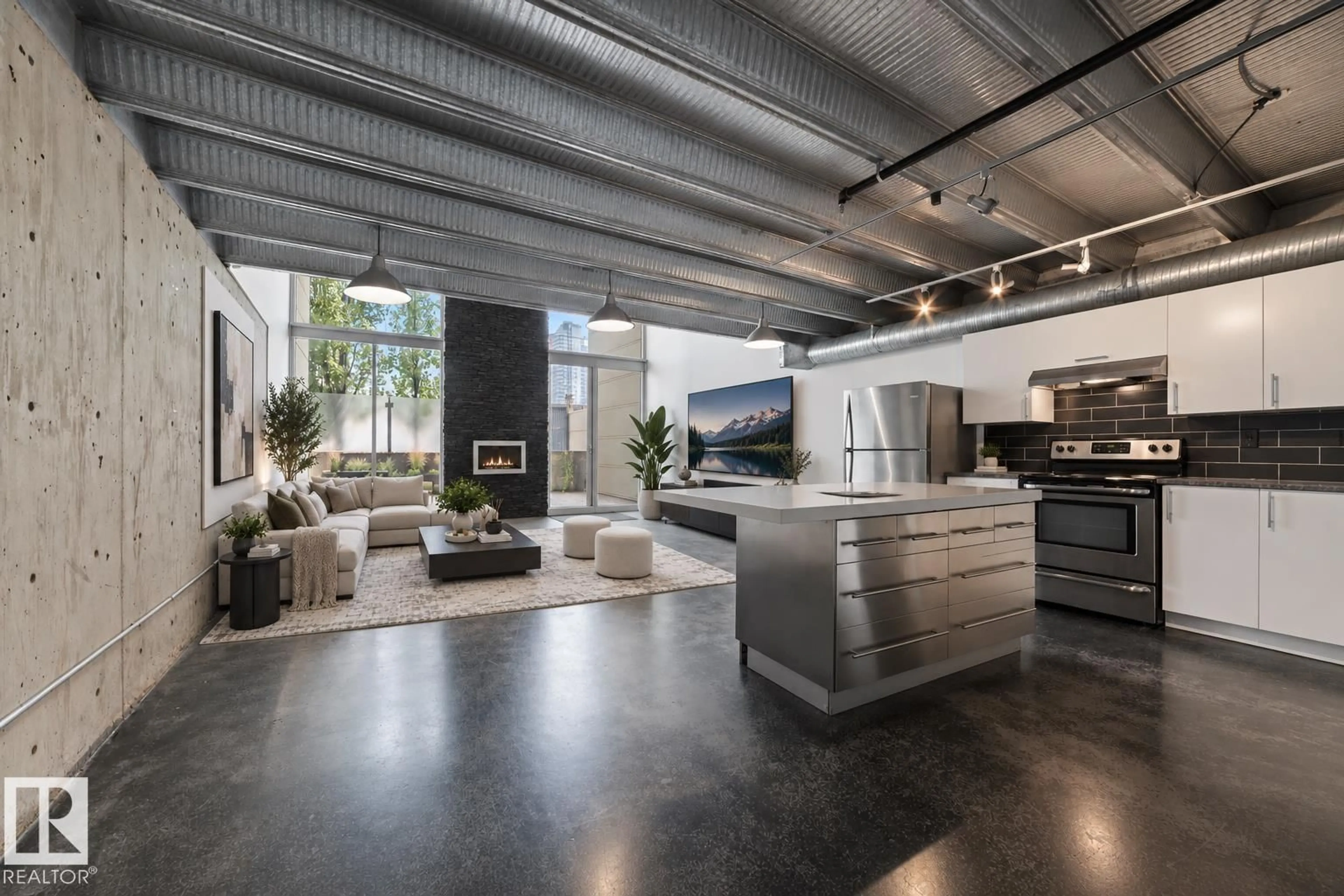 Open concept kitchen, cement floor for 130 10309 107 ST NW, Edmonton Alberta T5J1K3