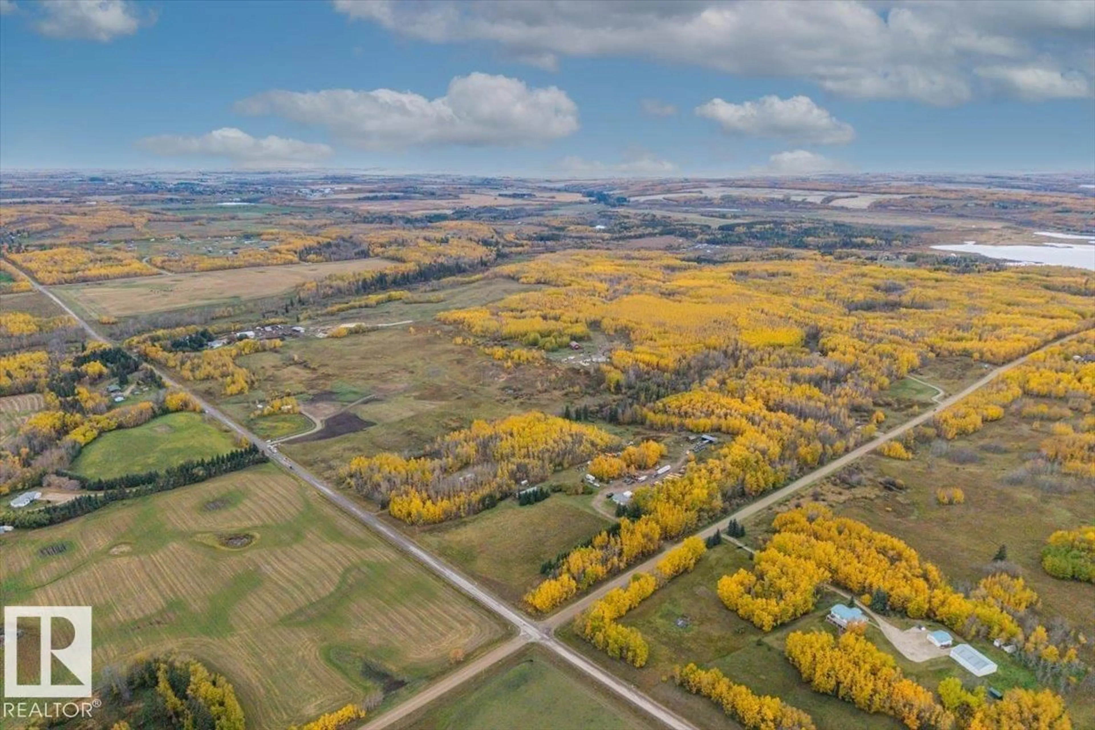 A pic from outside/outdoor area/front of a property/back of a property/a pic from drone, mountain view for 54404 RR 14, Rural Lac Ste. Anne County Alberta T0E1V0