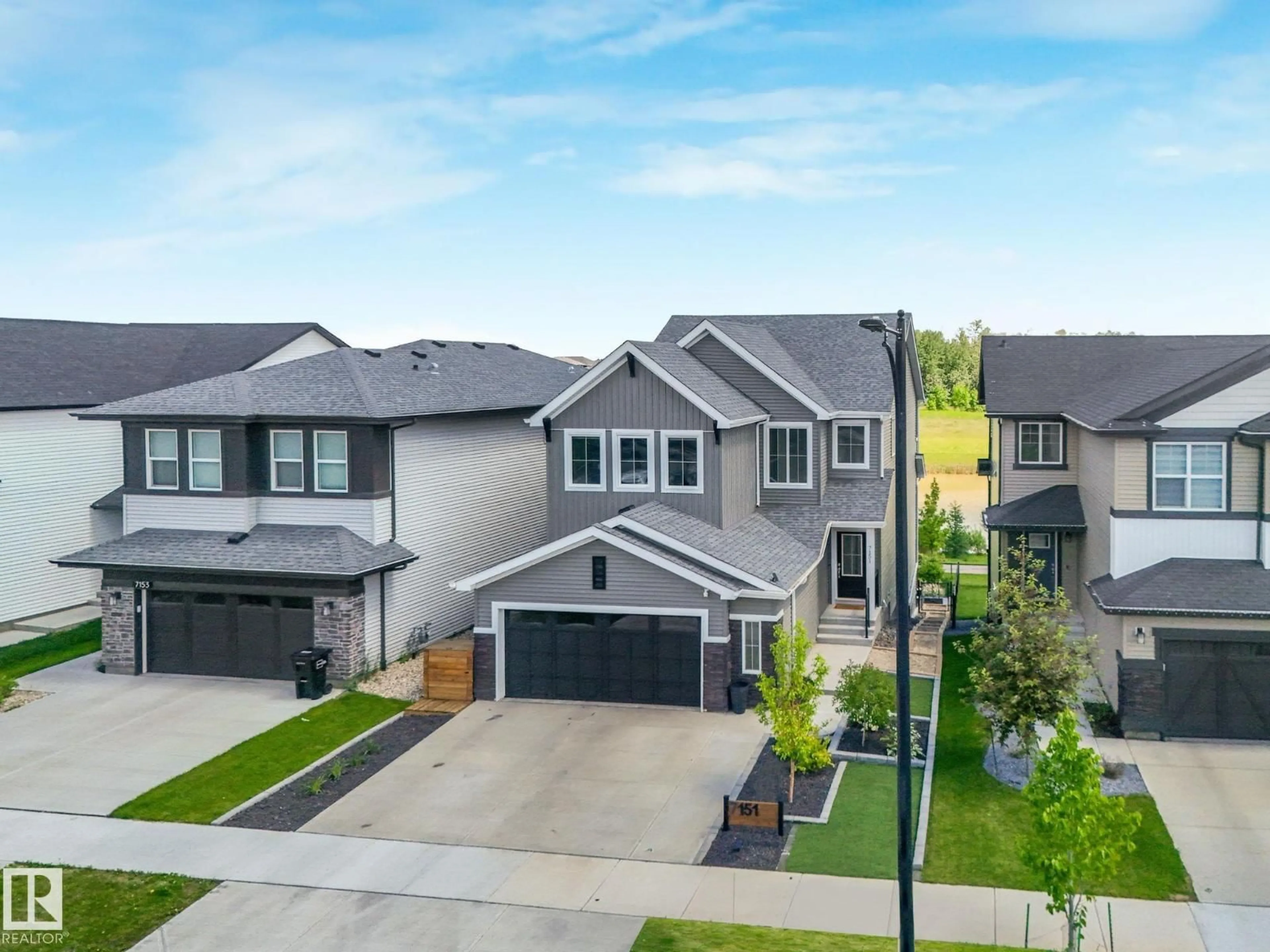 A pic from outside/outdoor area/front of a property/back of a property/a pic from drone, street for 7151 EDGEMONT WY, Edmonton Alberta T6M1K1