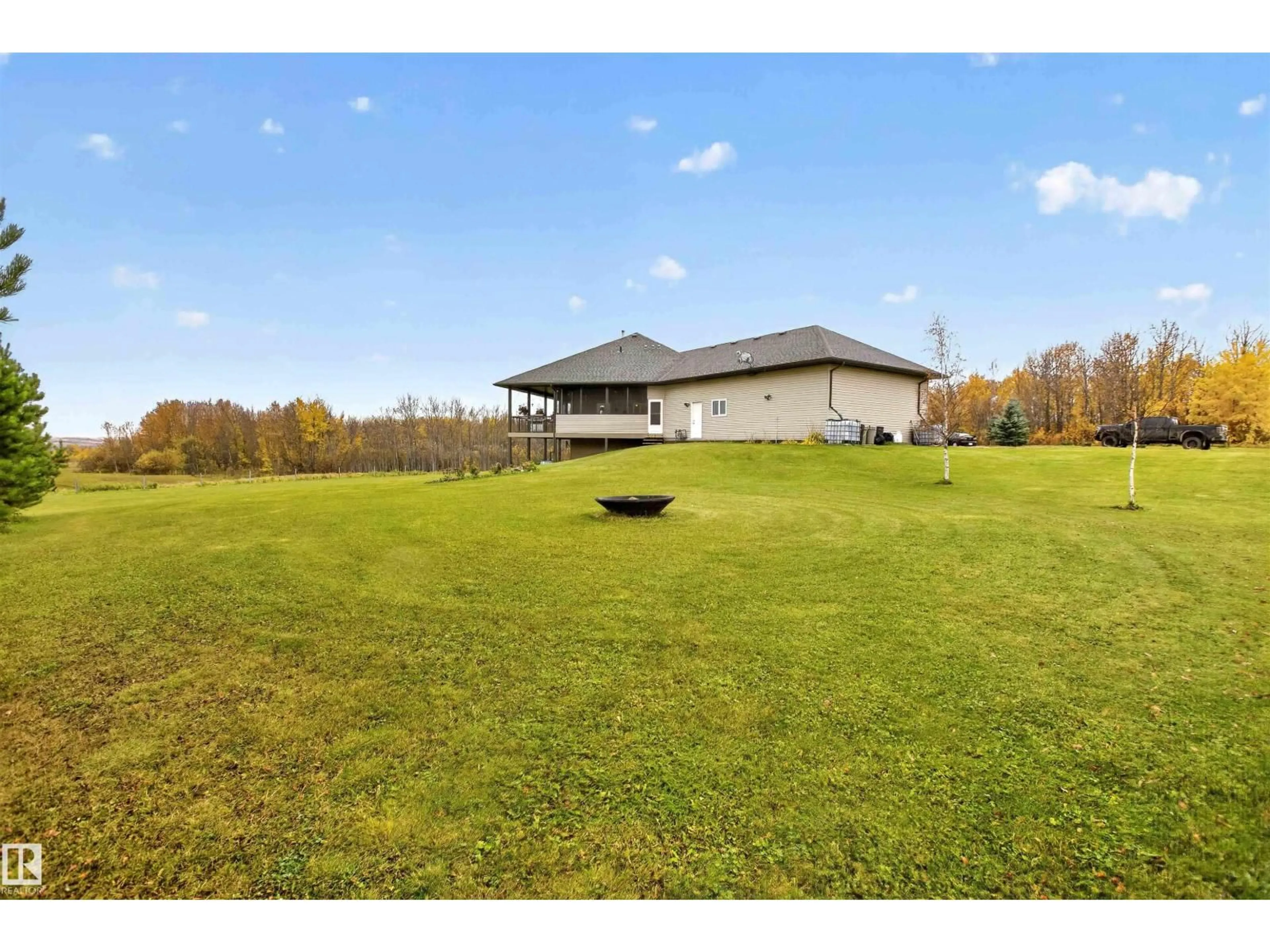 A pic from outside/outdoor area/front of a property/back of a property/a pic from drone, water/lake/river/ocean view for 57111 HWY 757, Rural Lac Ste. Anne County Alberta T0E2A0