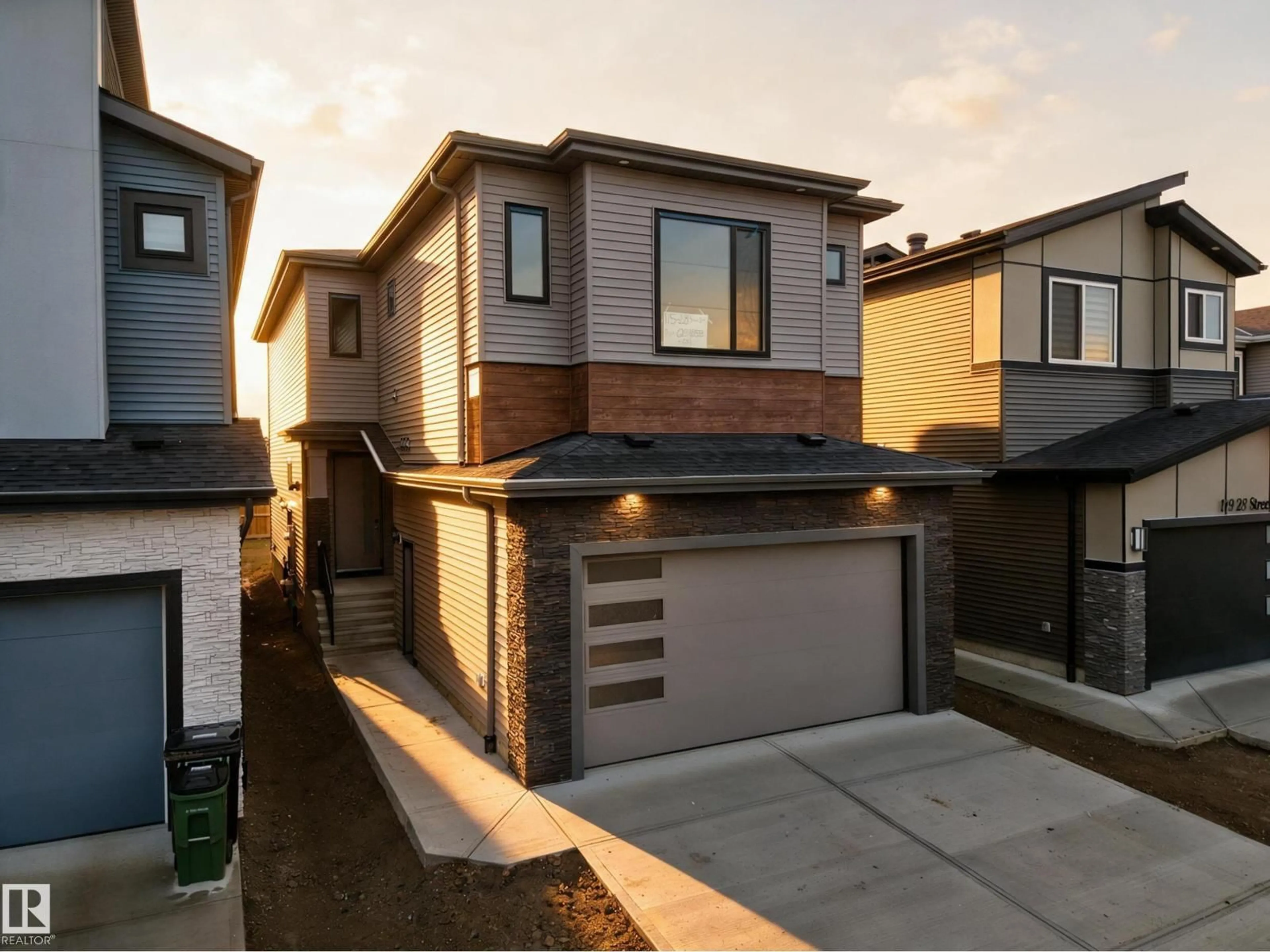 Home with brick exterior material, street for SW - 115 28 ST, Edmonton Alberta T6X1A7