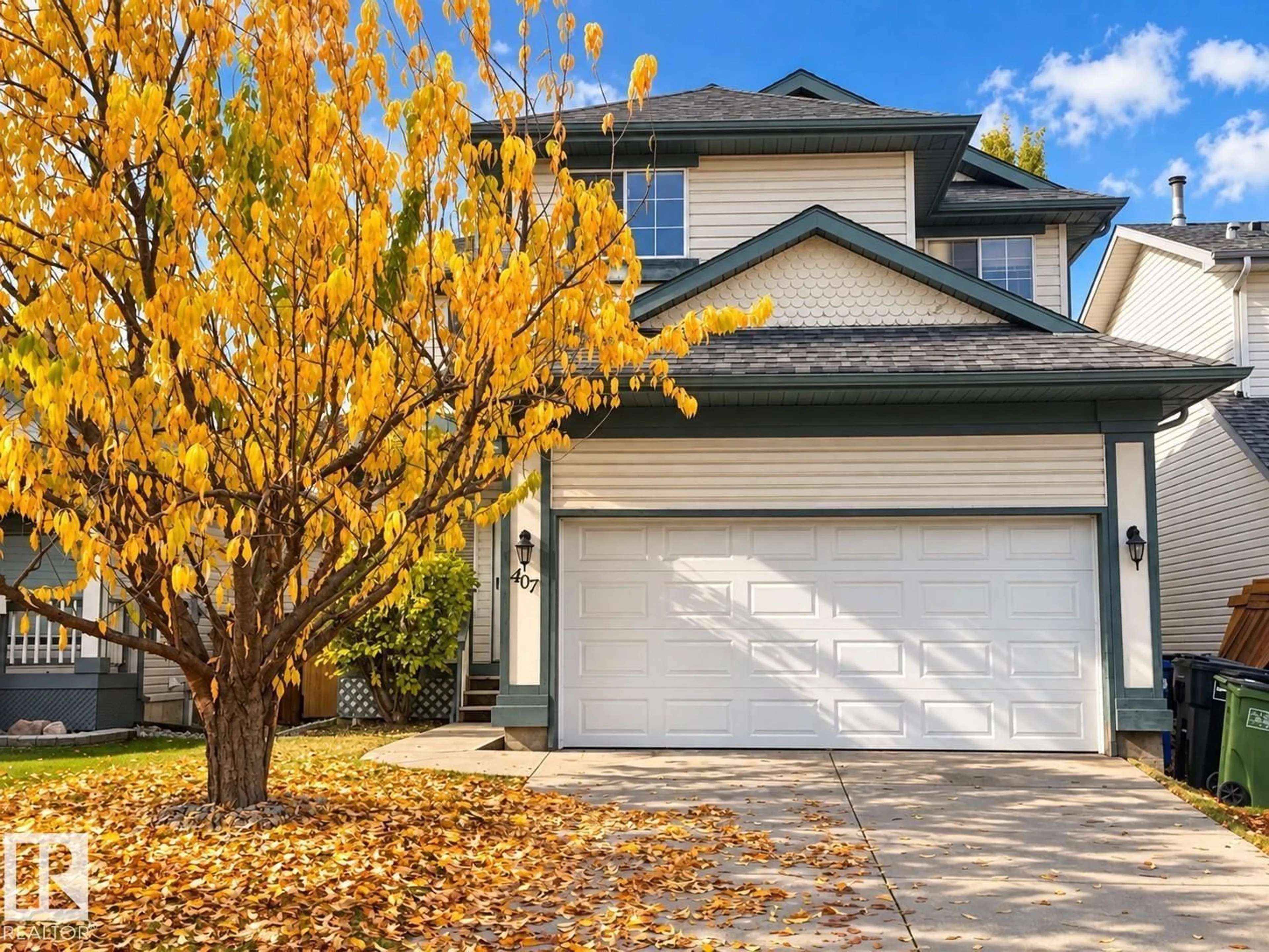 Home with vinyl exterior material, street for 407 BRECKENRIDGE LN, Edmonton Alberta T5T6E3