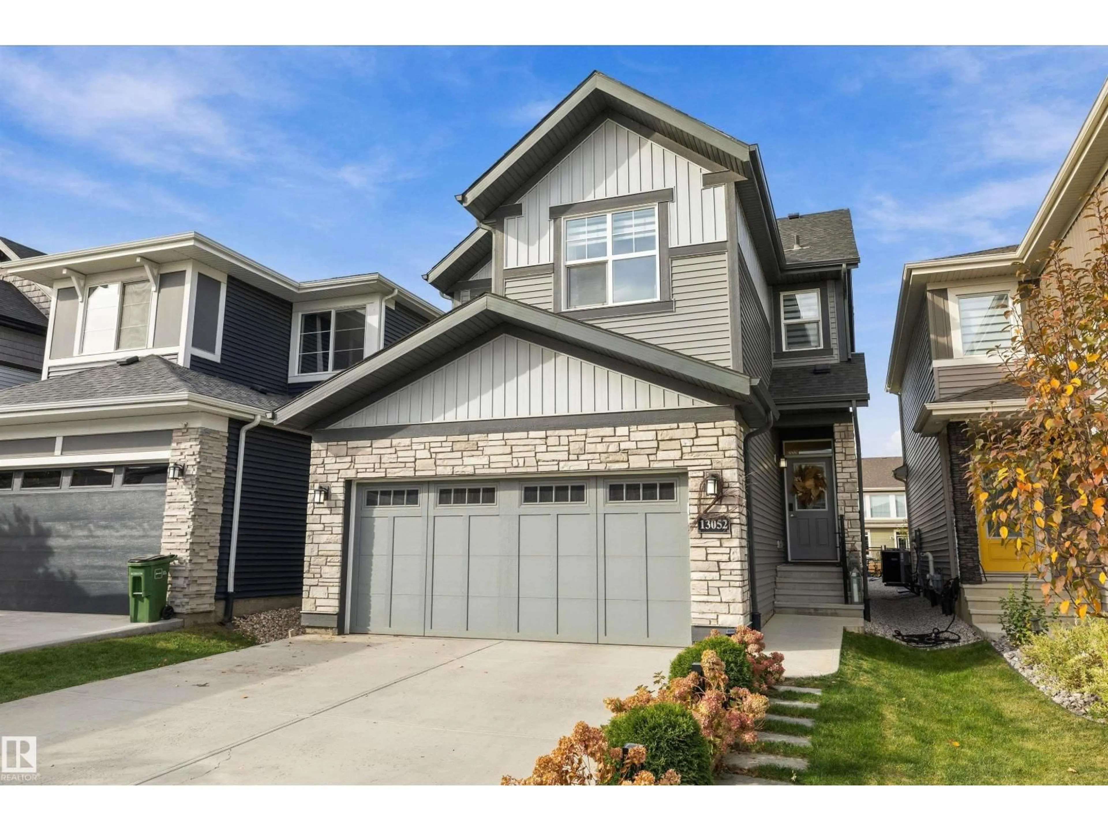 Home with vinyl exterior material, street for NW - 13052 211 ST, Edmonton Alberta T5S0P5