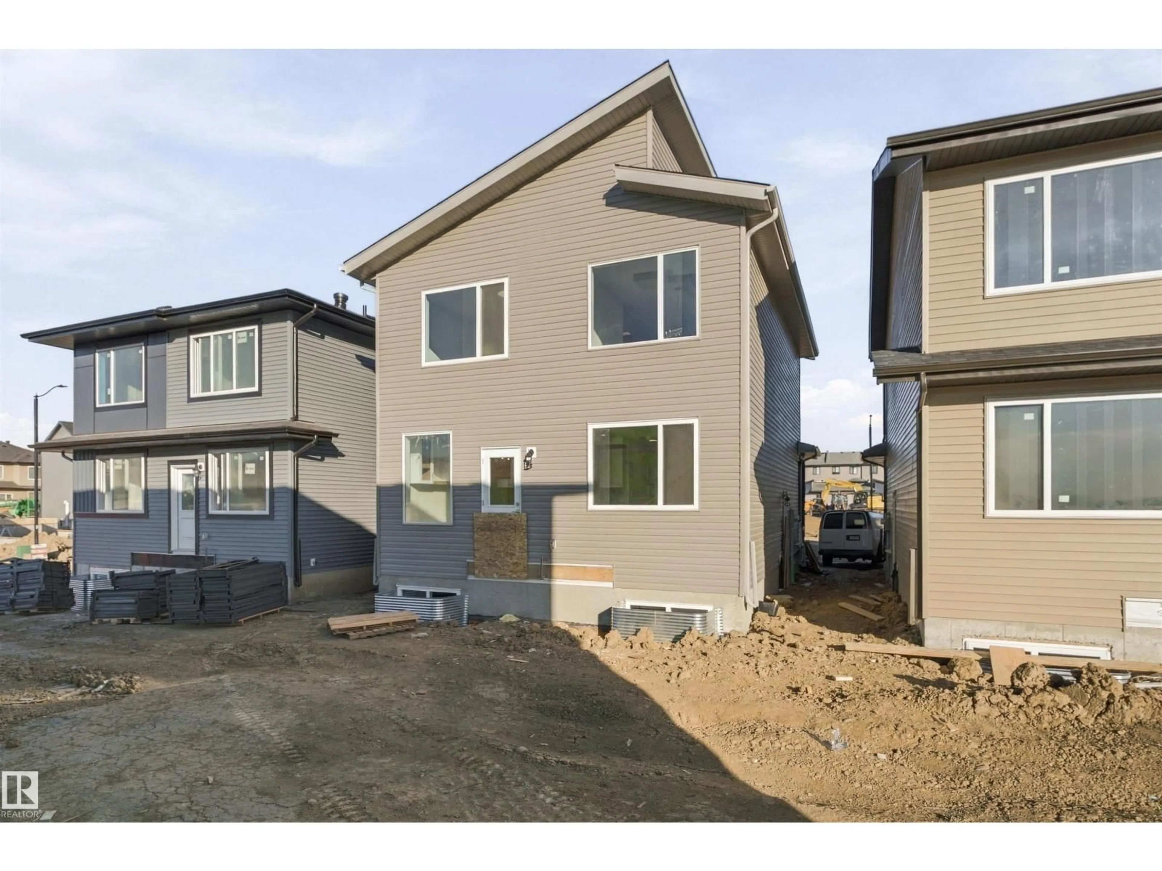 Home with vinyl exterior material, street for 3824 39 ST, Beaumont Alberta T4X3A1