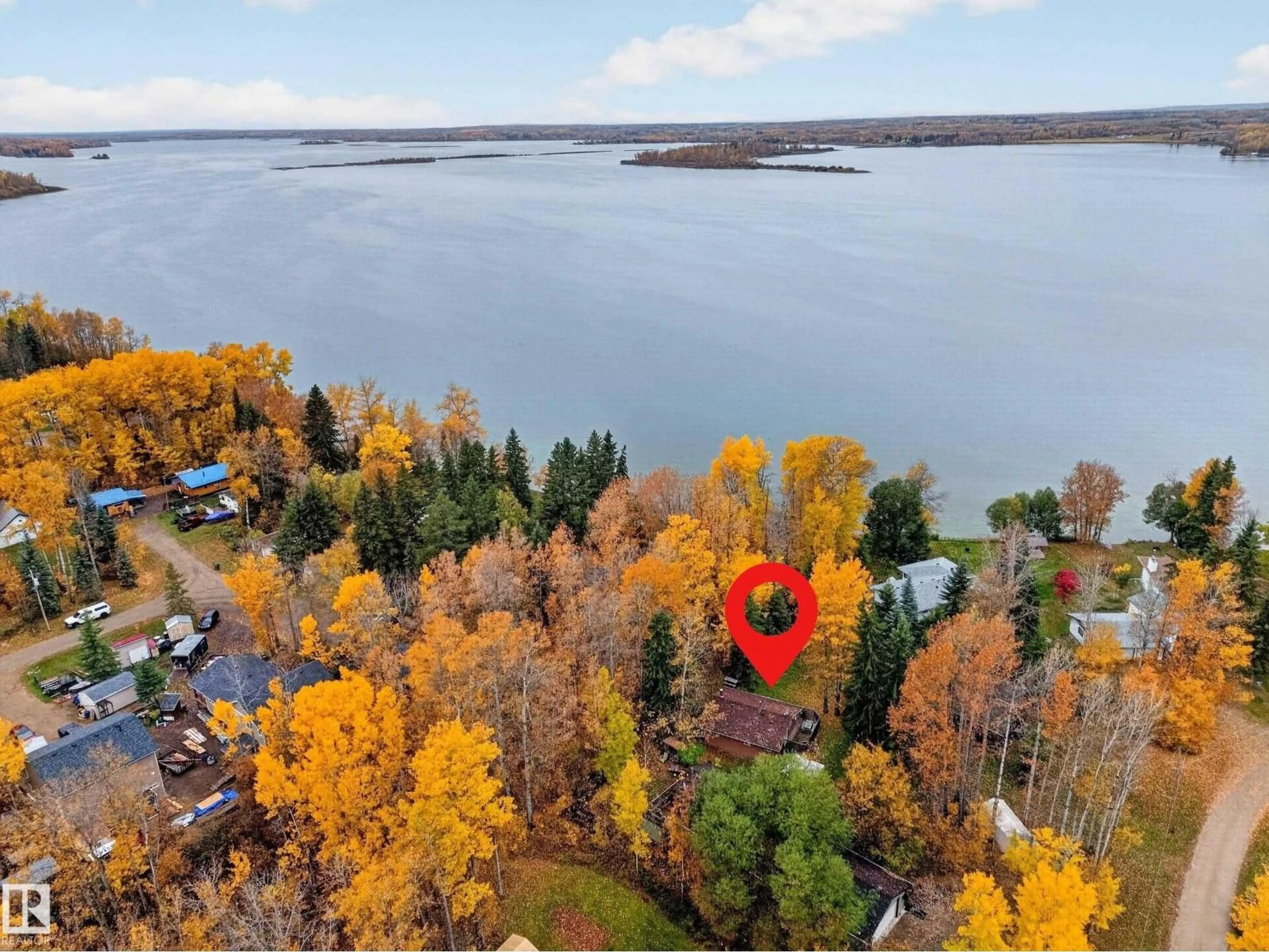 A pic from outside/outdoor area/front of a property/back of a property/a pic from drone, water/lake/river/ocean view for 5 ALDER AV, Rural Lac Ste. Anne County Alberta T0E0L0